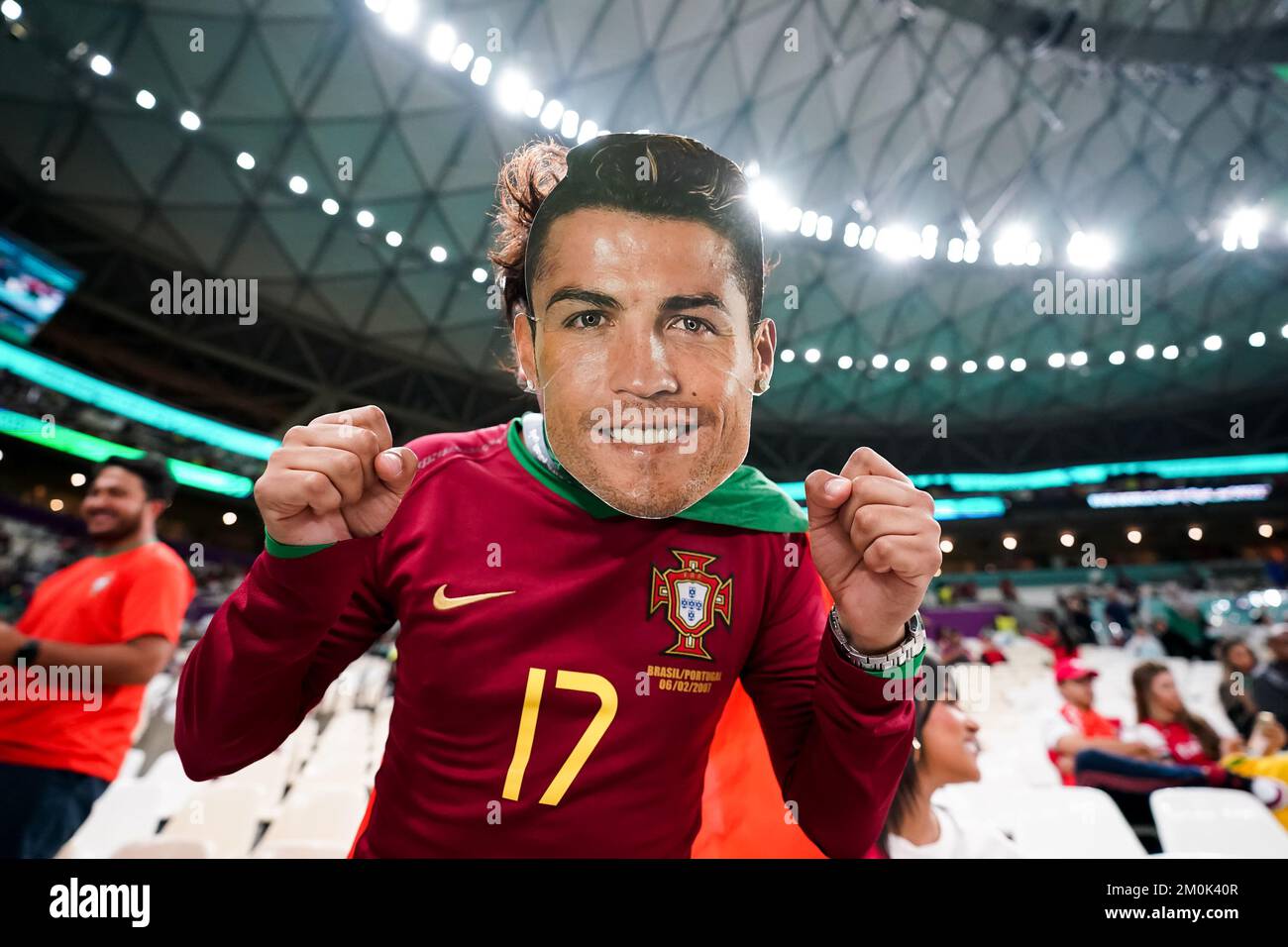 læbe kapillærer Historiker DOHA, QATAR - DECEMBER 6: Supporter of Portugal with a Cristiano Ronaldo  mask poses for a photo before the FIFA World Cup Qatar 2022 Round of 16  match between Portugal and Switzerland