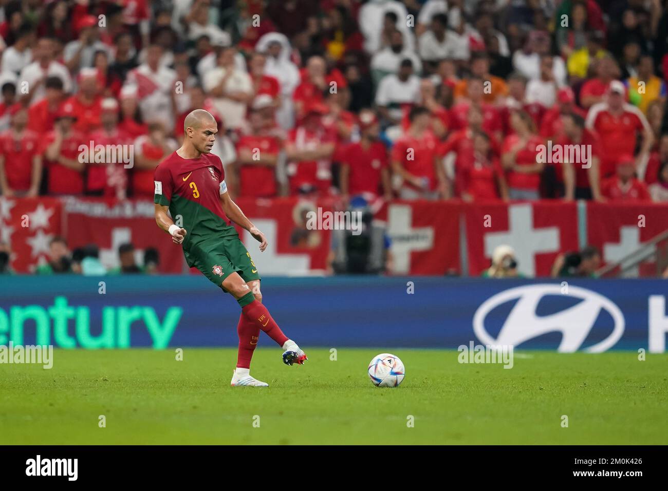 LUSAIL, QATAR - DECEMBER 6: Player of Portugal Pepe passes the ball during the FIFA World Cup Qatar 2022 Round of 16 match between Portugal and Switzerland at Lusail Stadium on December 6, 2022 in Lusail, Qatar. (Photo by Florencia Tan Jun/PxImages) Stock Photo