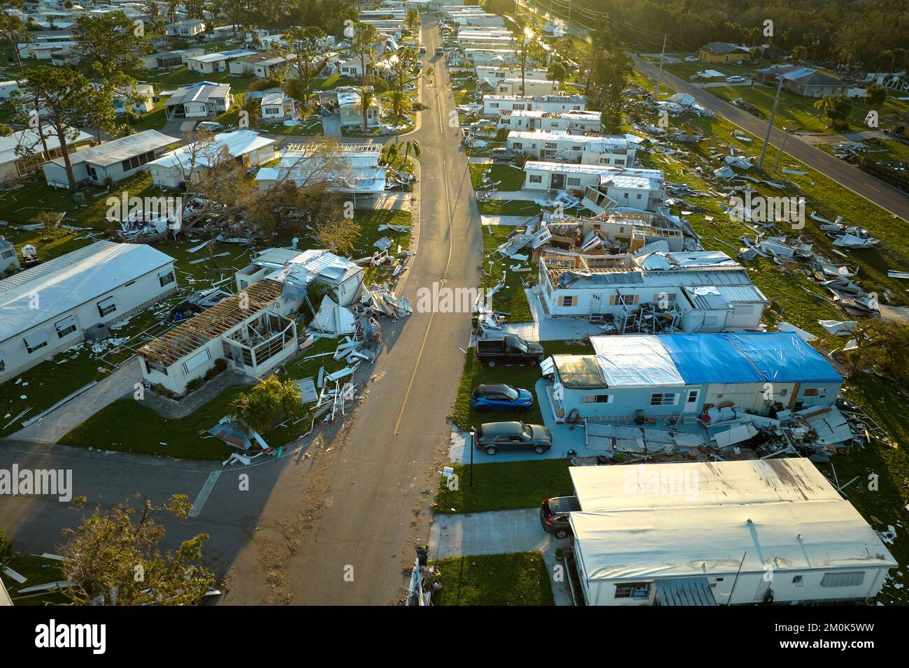 Badly damaged mobile homes after hurricane Ian in Florida residential