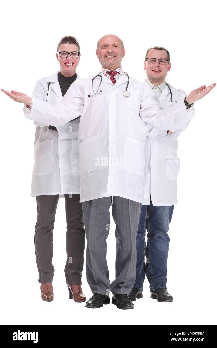 Team of doctors standing arms crossed and smiling at camera Stock Photo