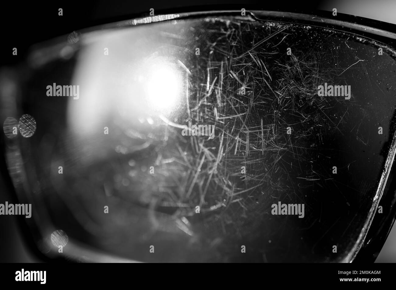macro of the scratched surface of a polarized sunglasses lens Stock