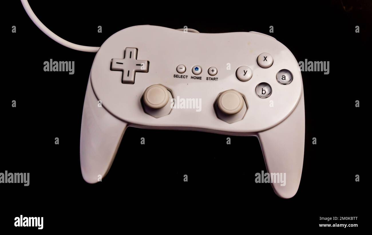 white joystick isolated on black background Stock Photo - Alamy