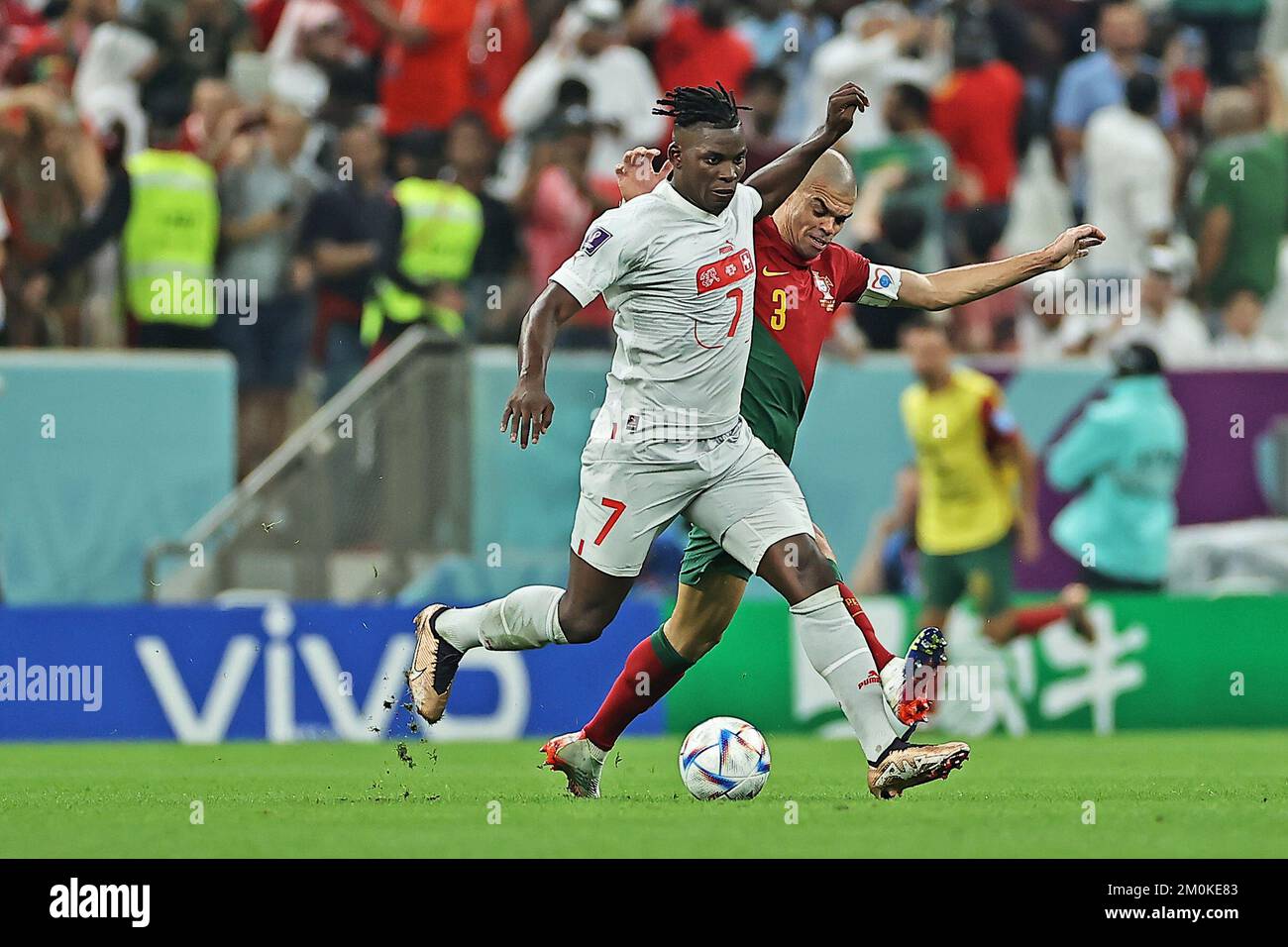 Lusail Stadium, Qatar. 6th Dec, 2022. FIFA World Cup, final 16 stage, Portugal versus Switzerland: Pepe of Portugal challenges Breel Embolo of Switzerland Credit: Action Plus Sports/Alamy Live News Stock Photo