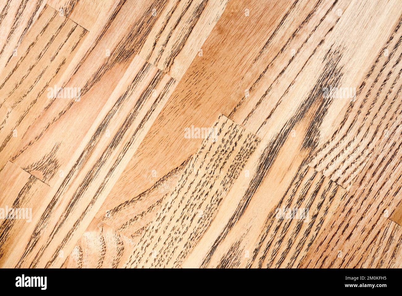 Solid ash glued timber under varnish countertop tabletop closeup wooden
