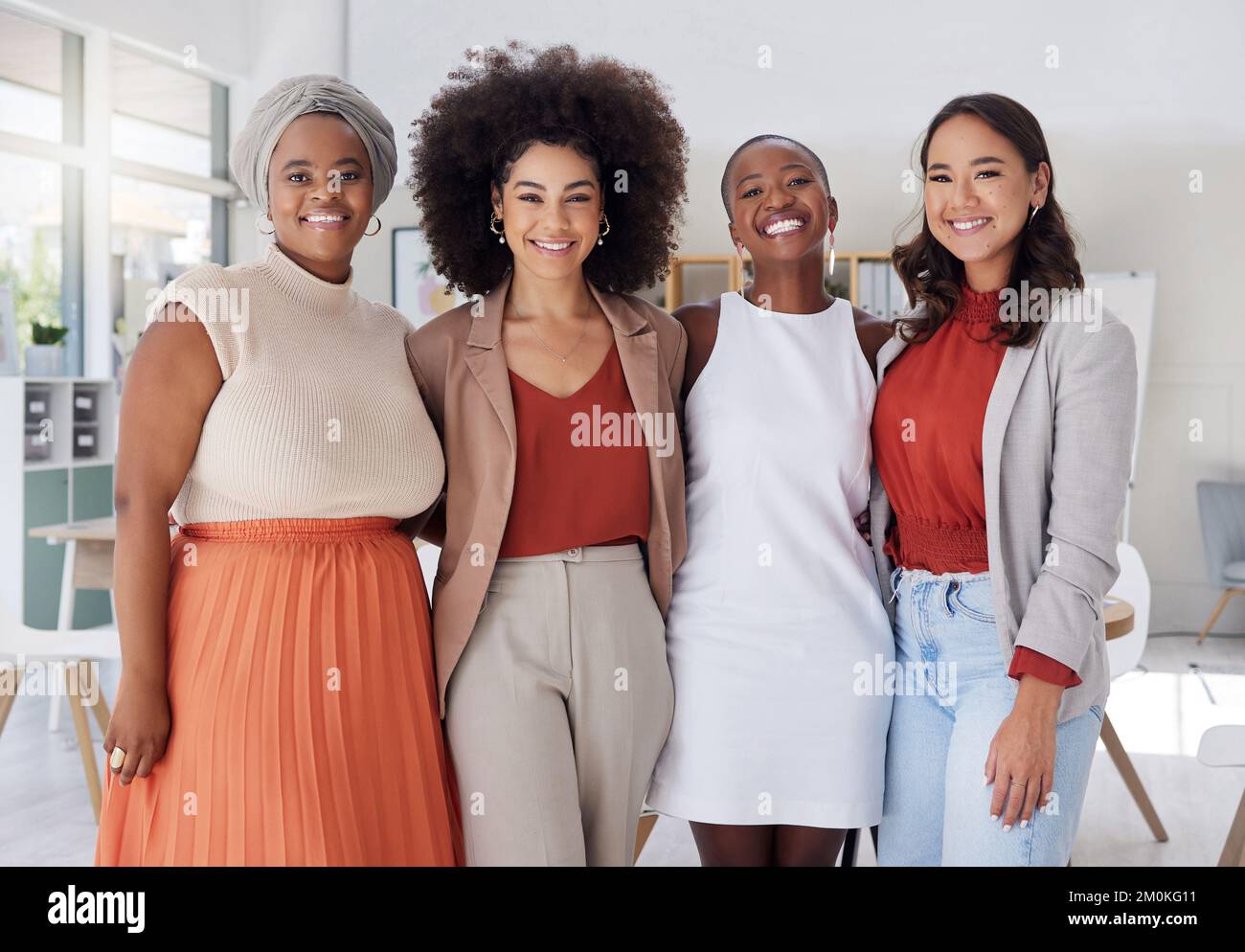 Happy diverse women smiling hi-res stock photography and images - Alamy