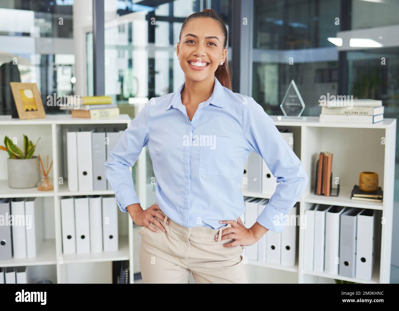 Proud, office and business woman in portrait for corporate vision, company success and folder management strategy in administration. Happy woman Stock Photo