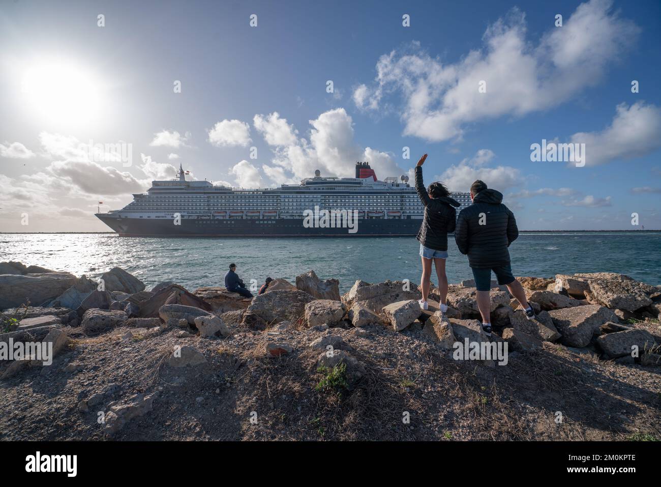 Adelaide, Australia. 7 December 2022. People wave off RMS Queen