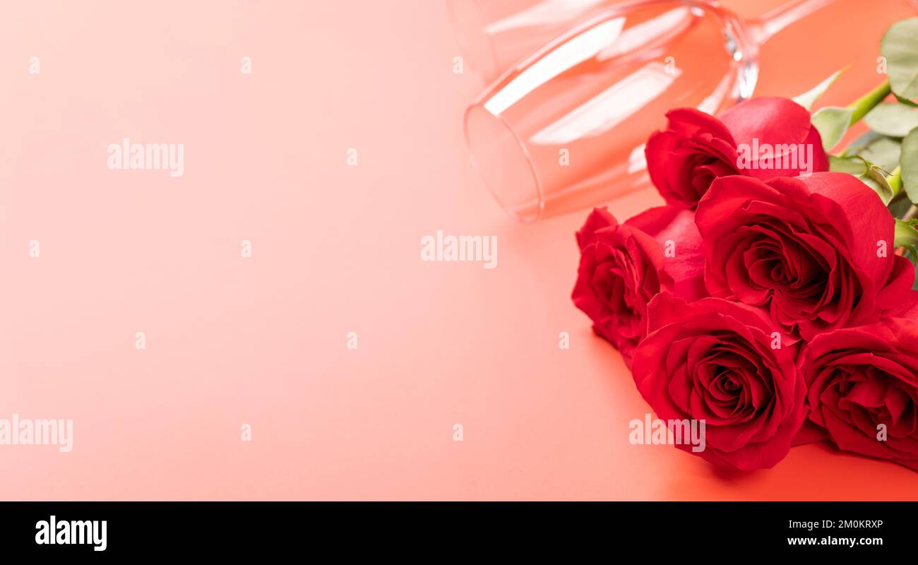 Valentines day card with champagne glasses and rose flowers. On red ...