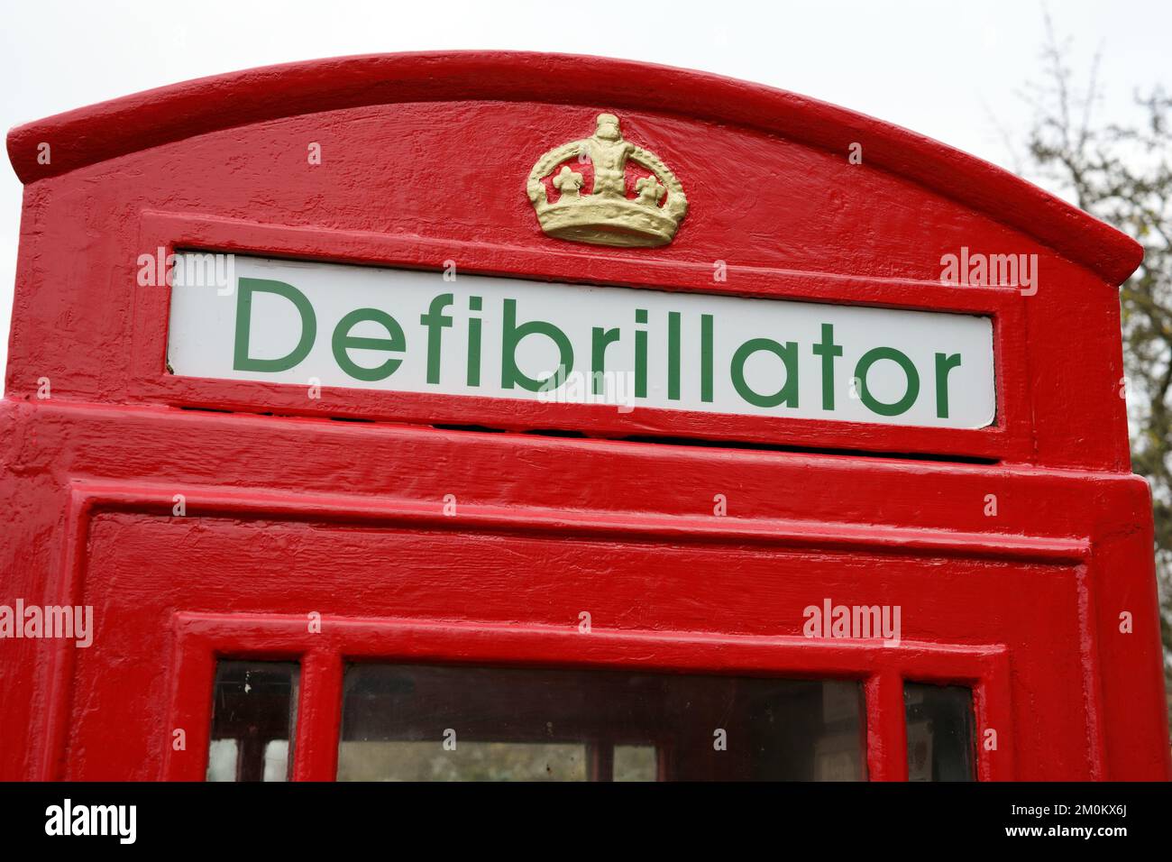 Public Access Defibrillator in old phone box, Stubton, Lincolnshire Stock Photo