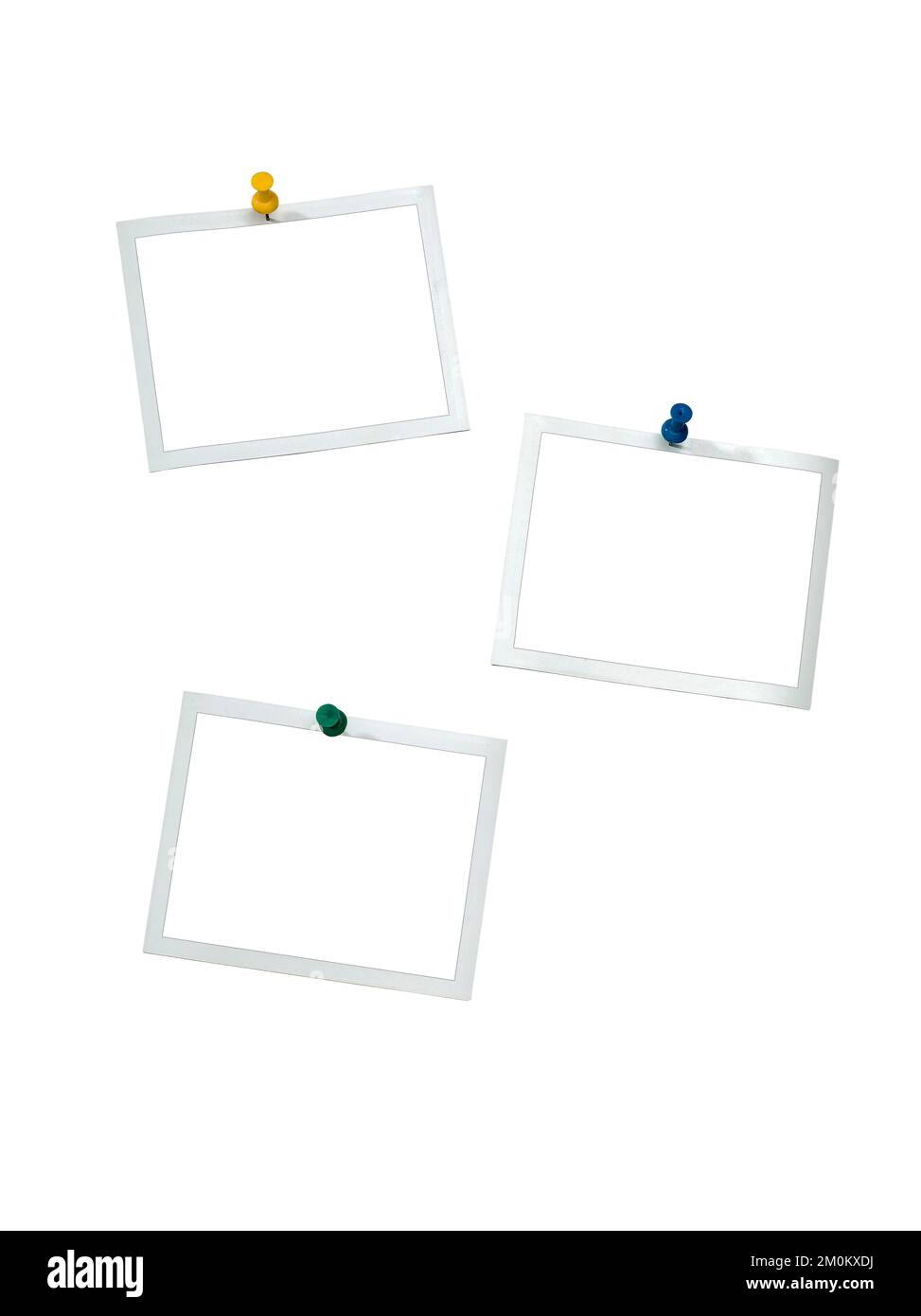Instant frames hang on wall with colored pins. Isolated on White with
