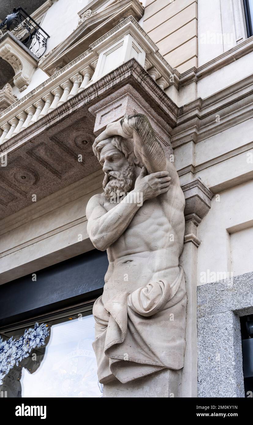 Detail of a telamon in the façade of Grand Palace building, Bernardino Luini square, Lugano city center, Canton Ticino, Switzerland Stock Photo