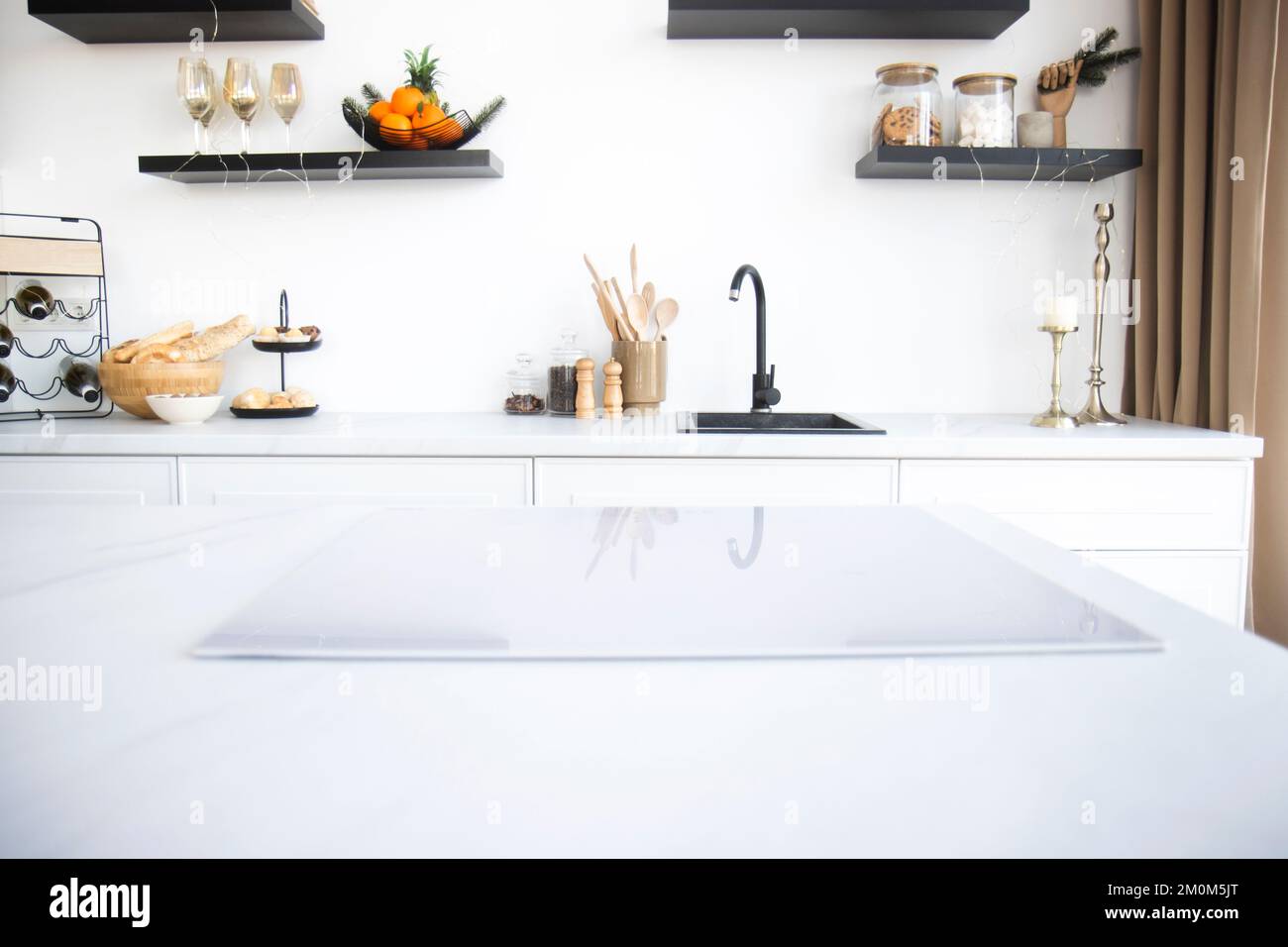 white kitchen with induction hob Stock Photo Alamy