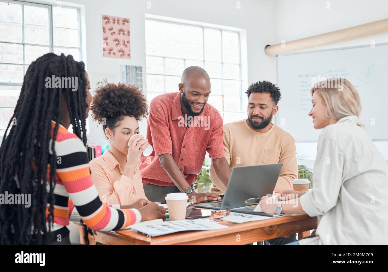 Group of happy diverse businesspeople having a meeting in a modern ...
