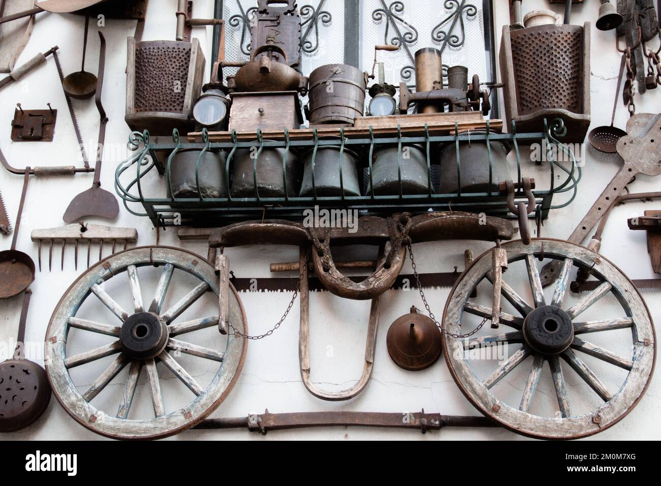 Iron craft tools on a white wall background Stock Photo