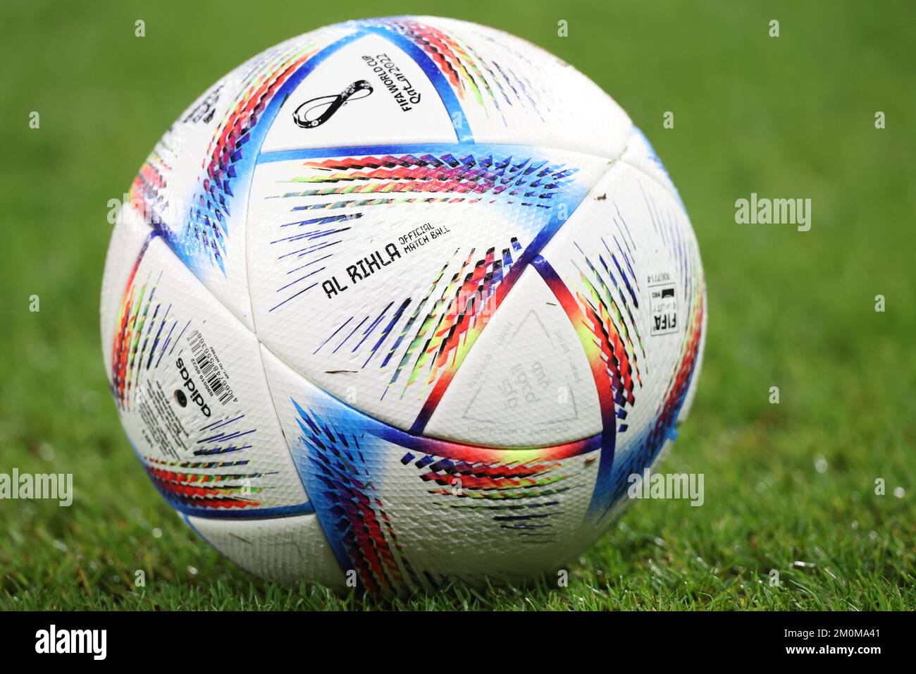 Doha, Qatar. 30th Nov, 2022. An official match ball 'Al Rihla' for 2022 Qatar World Cup is seen on the pitch in Doha, Qatar, Nov. 30, 2022. According to the FIFA statement, a sensor positioned in center of 'Al Rihla' sends data 500 times per second, allowing a very precise detection of the kick point to enable referees to make faster, more accurate offside decisions. Credit: Cao Can/Xinhua/Alamy Live News Stock Photo