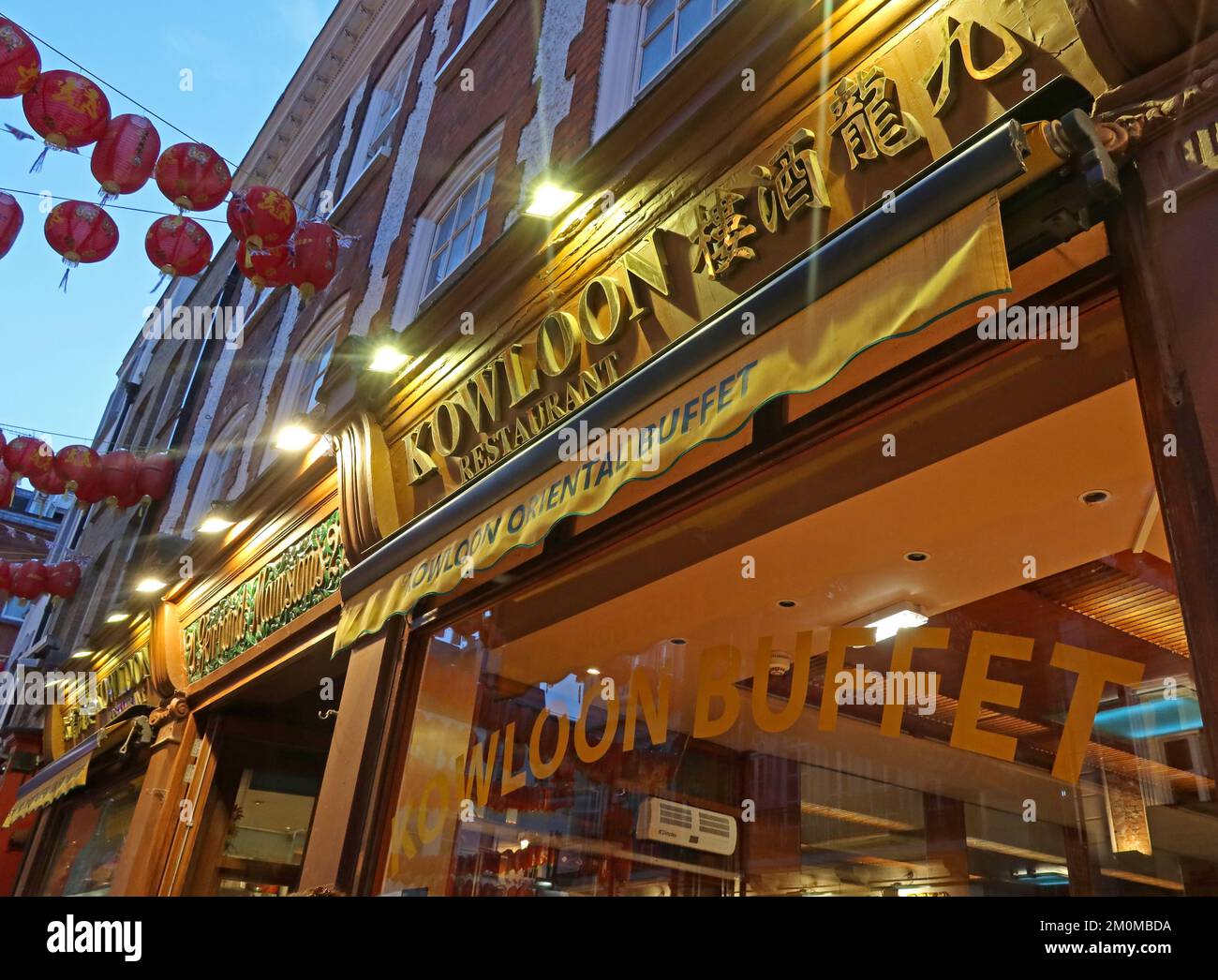 Kowloon Hong Kong style Chinese Buffet restaurant, 21-22 Gerrard St, Chinatown, SOHO, London, England, UK, W1D 6JH at dusk Stock Photo