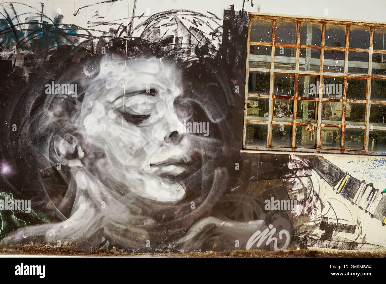 Graffiti on the facade of an abandoned building in Athens Greece Stock Photo