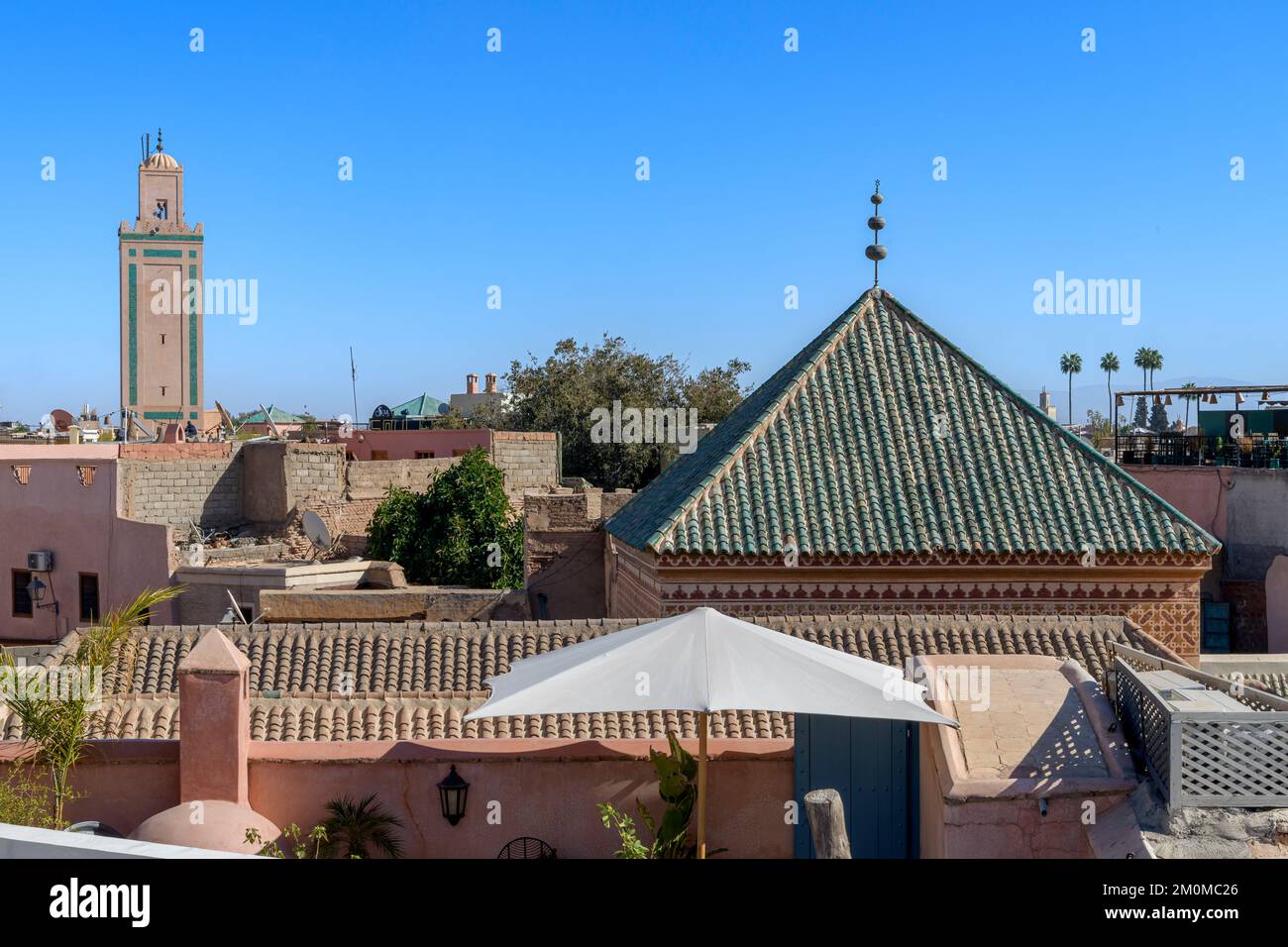 Riad Assala in Marrakech. Two connected riads with stylish and intimate spaces, a central, formal, pool plus roof garden overlooking the city. Stock Photo