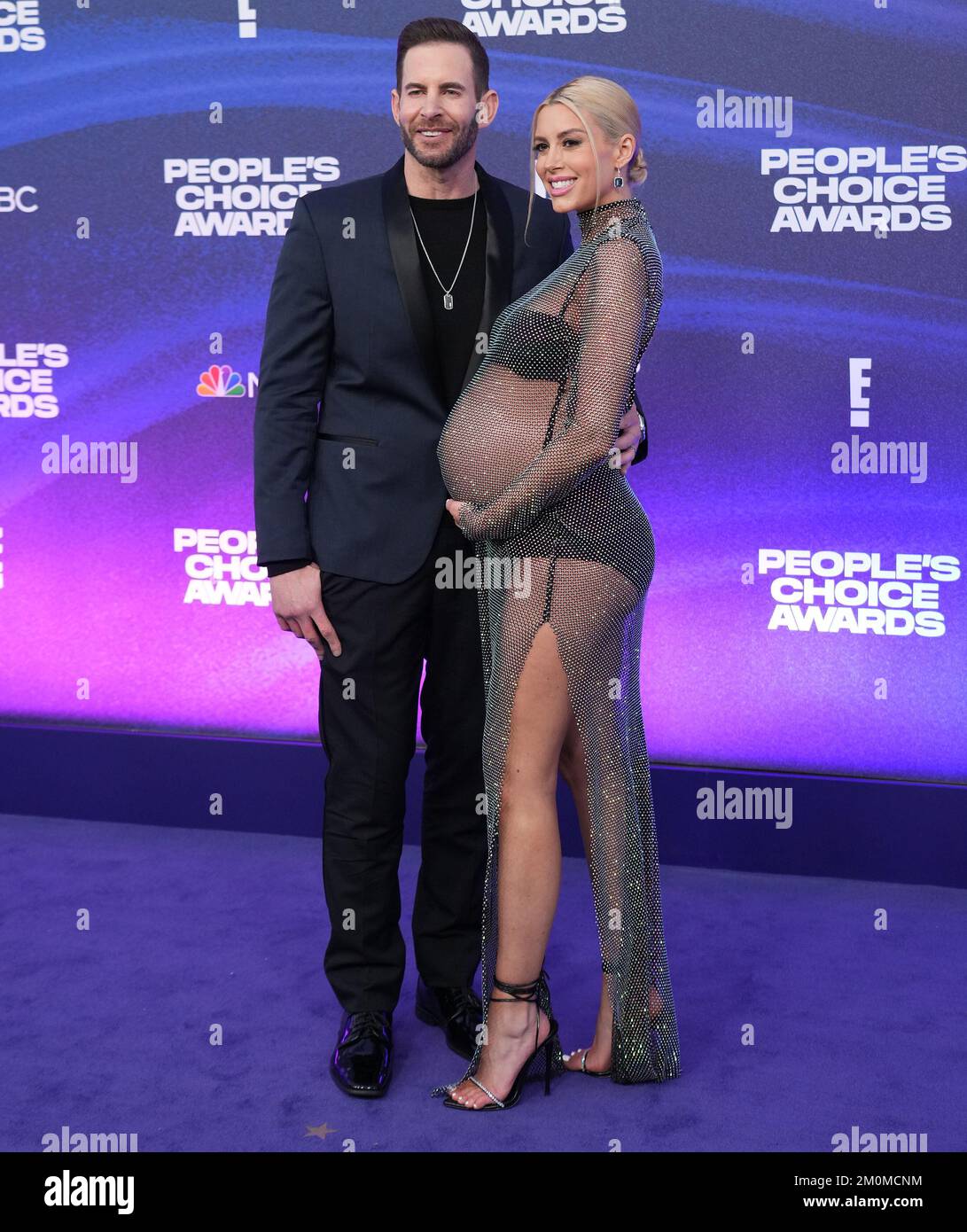 (LR) Tarek El Moussa and Heather Rae El Moussa arrives at the 2022