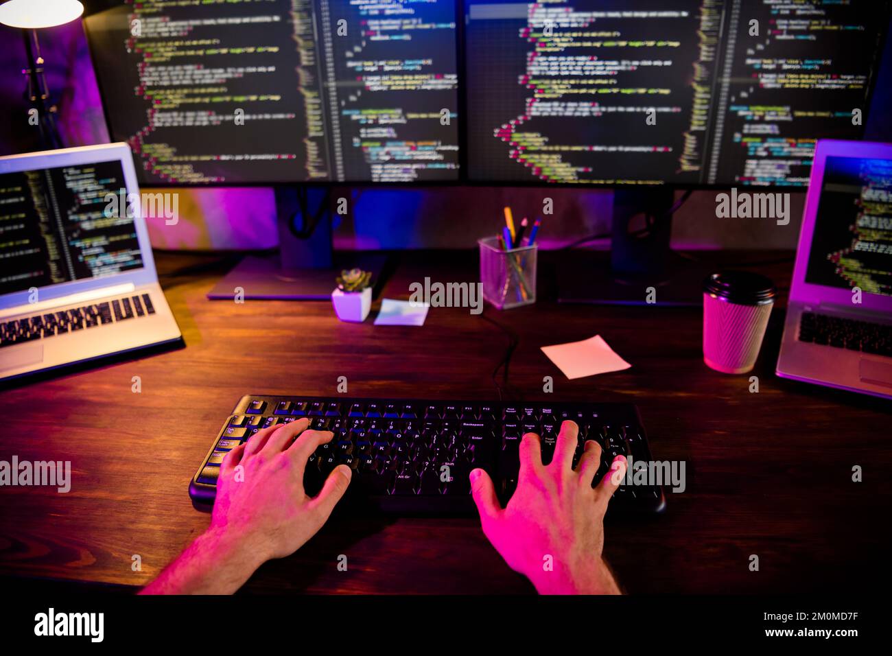 Photo of guy hands arms working front back end programming indoors ...