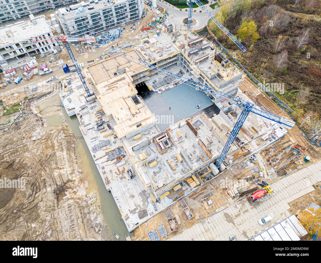 Aerial view of construction site with crane and building. Top view of ...