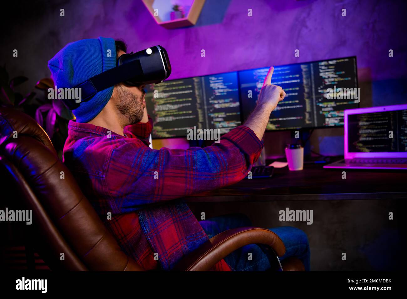 Photo of dreamy excited programmer wear spectacles pointing finger ...