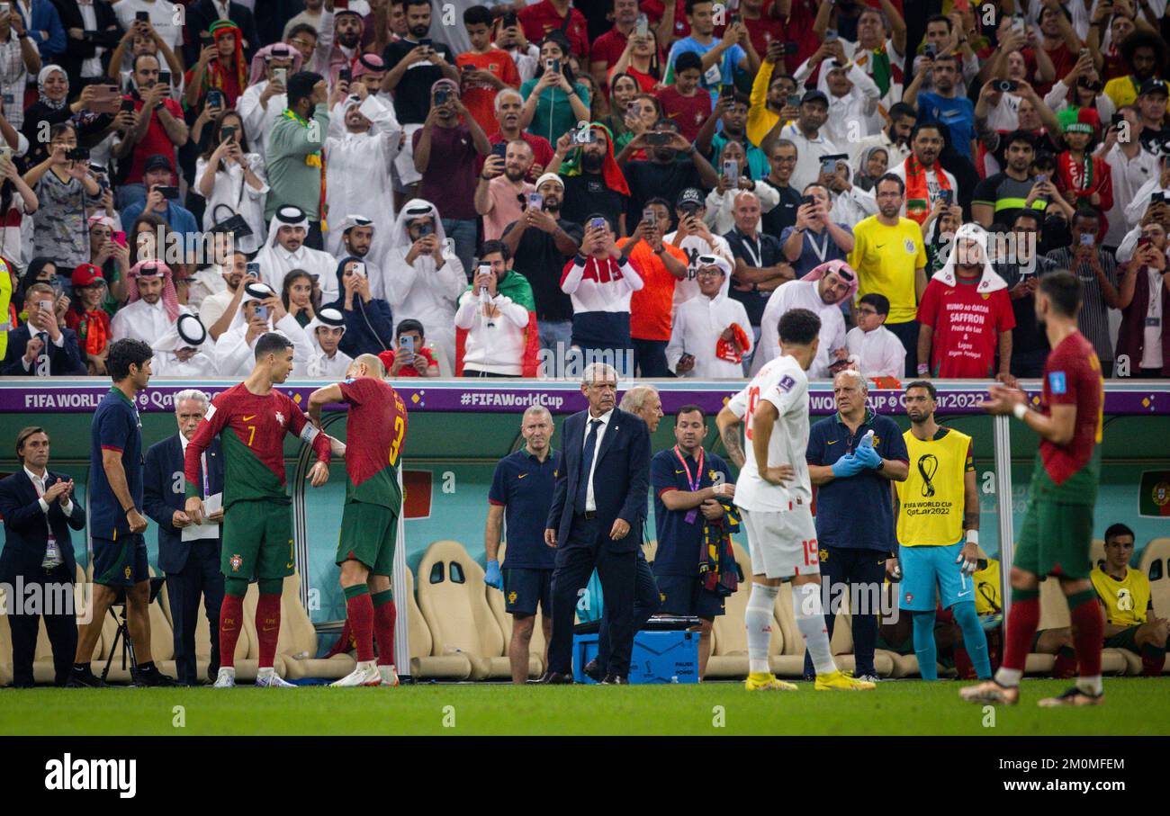 Doha, Qatar. 6th Dec, 2022.  Pepe (Portugal)  hands Cristiano Ronaldo (Portugal) the captain's armband Portugal - Switzerland Portugal - Schweiz World Stock Photo