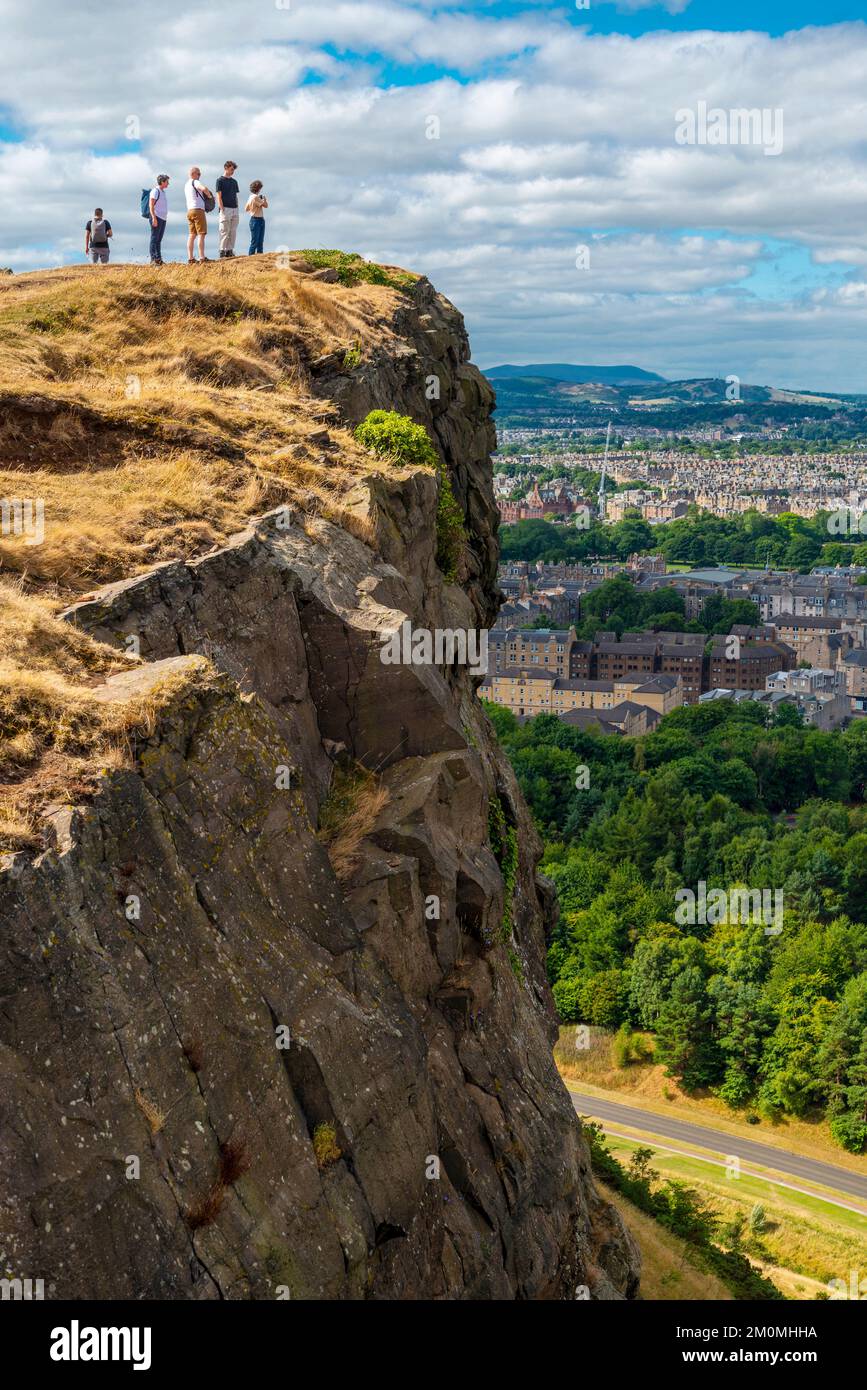 Edinburgh,ScotlandAugust 01 2022 Visitors climb to Arthur's seat and Crow Hill to admire