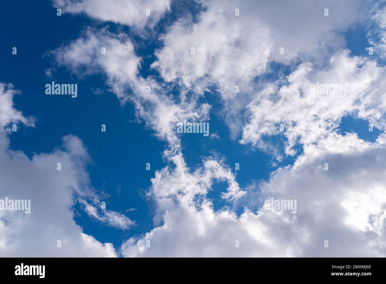 Dramatic blue sky with white clouds Stock Photo - Alamy