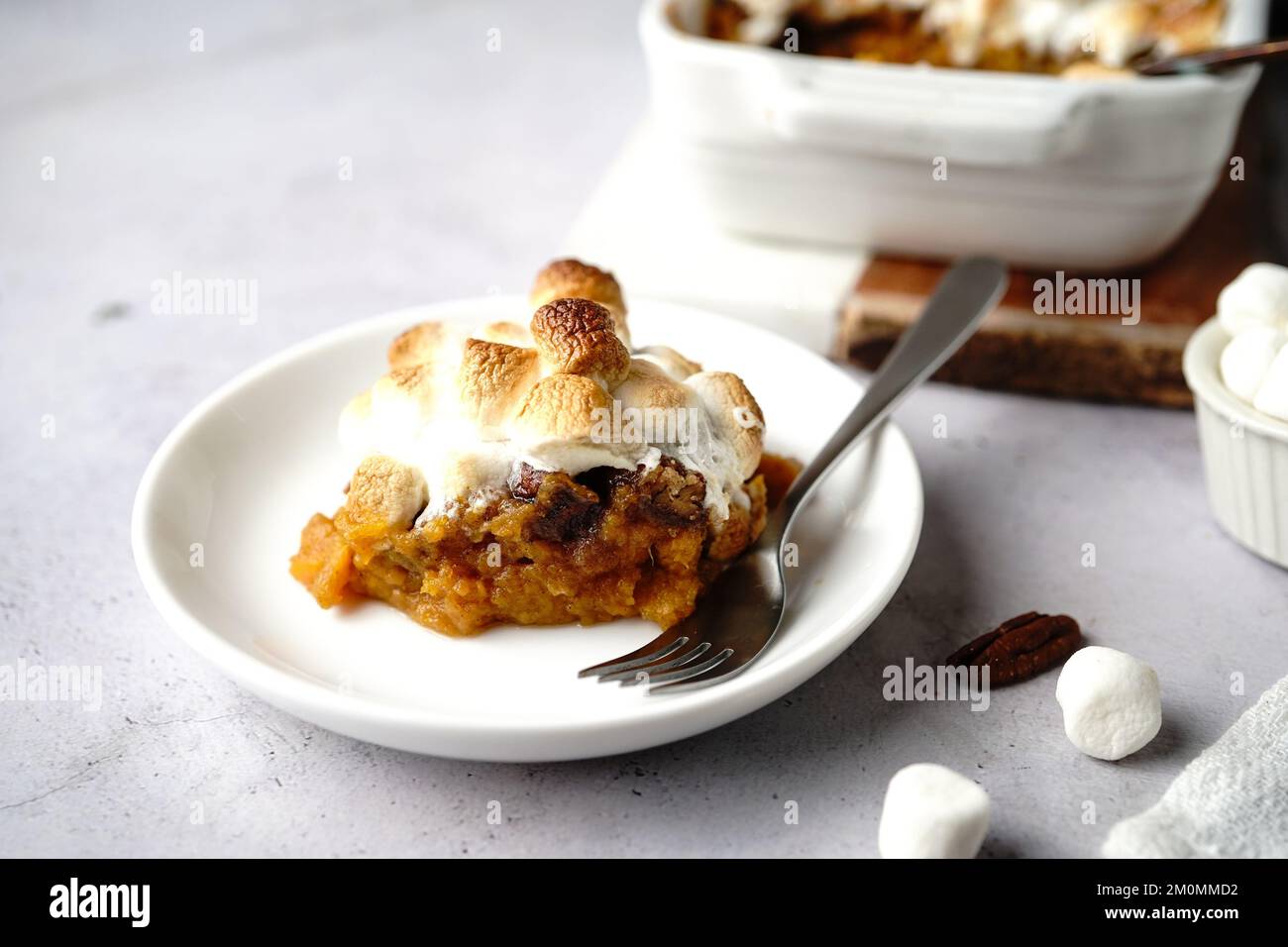 Homemade Sweet potato casserole topped with toasted marshmallows - holiday foods Stock Photo
