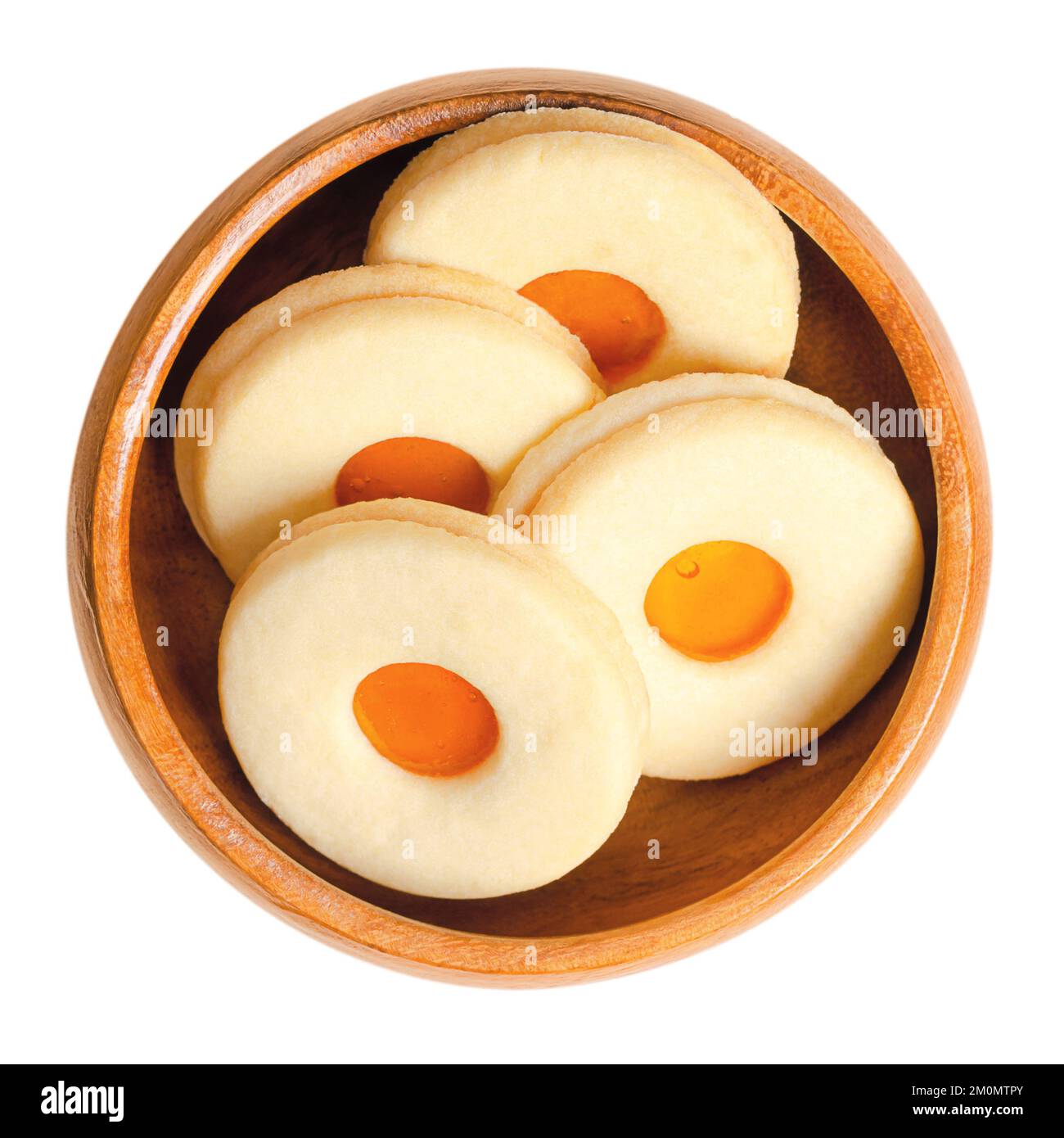 Linzer cookies, traditional Austrian Christmas biscuits, in a wooden bowl. Classic round butter cookies of shortbread. Stock Photo