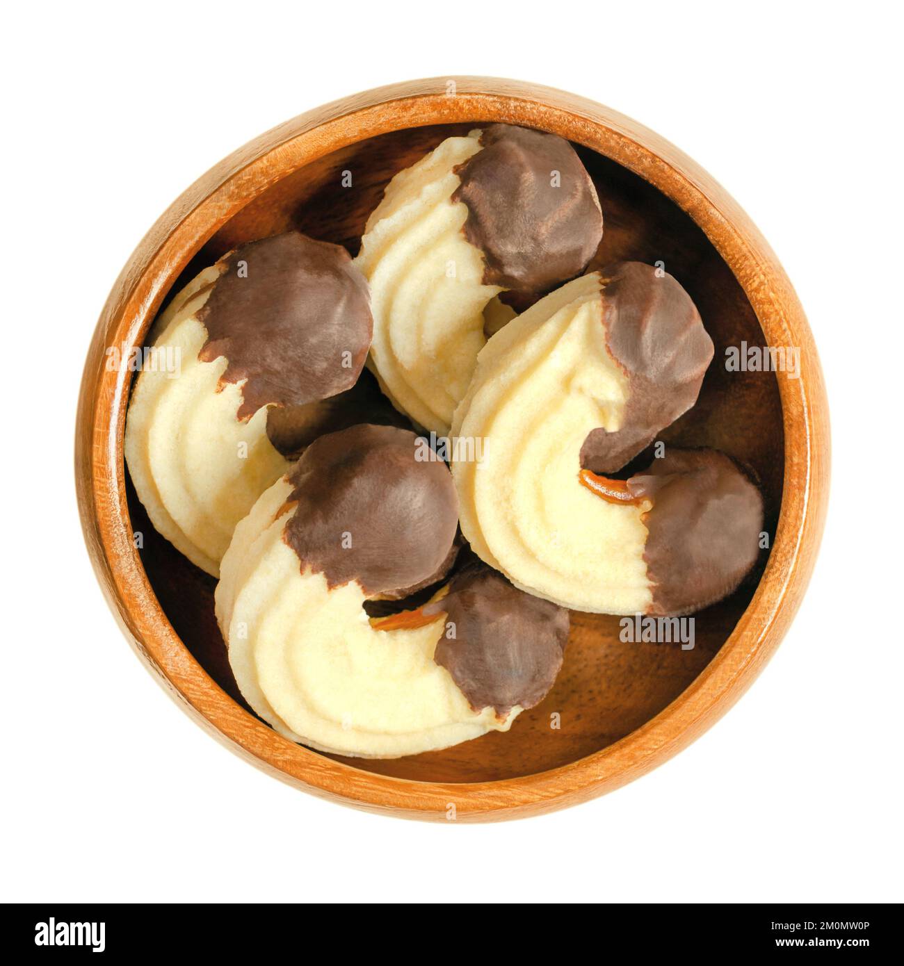 Crescent shaped butter cookies, Linzer Kipferl, in a wooden bowl. Traditional Austrian Christmas biscuits. Stock Photo