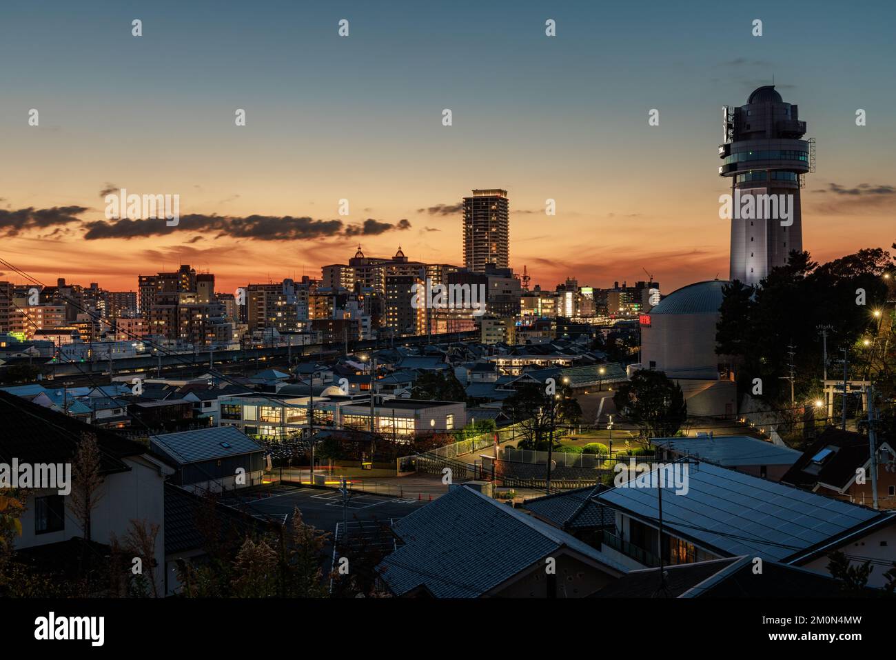 After sunset glow behind Akashi clocktower and city in early evening