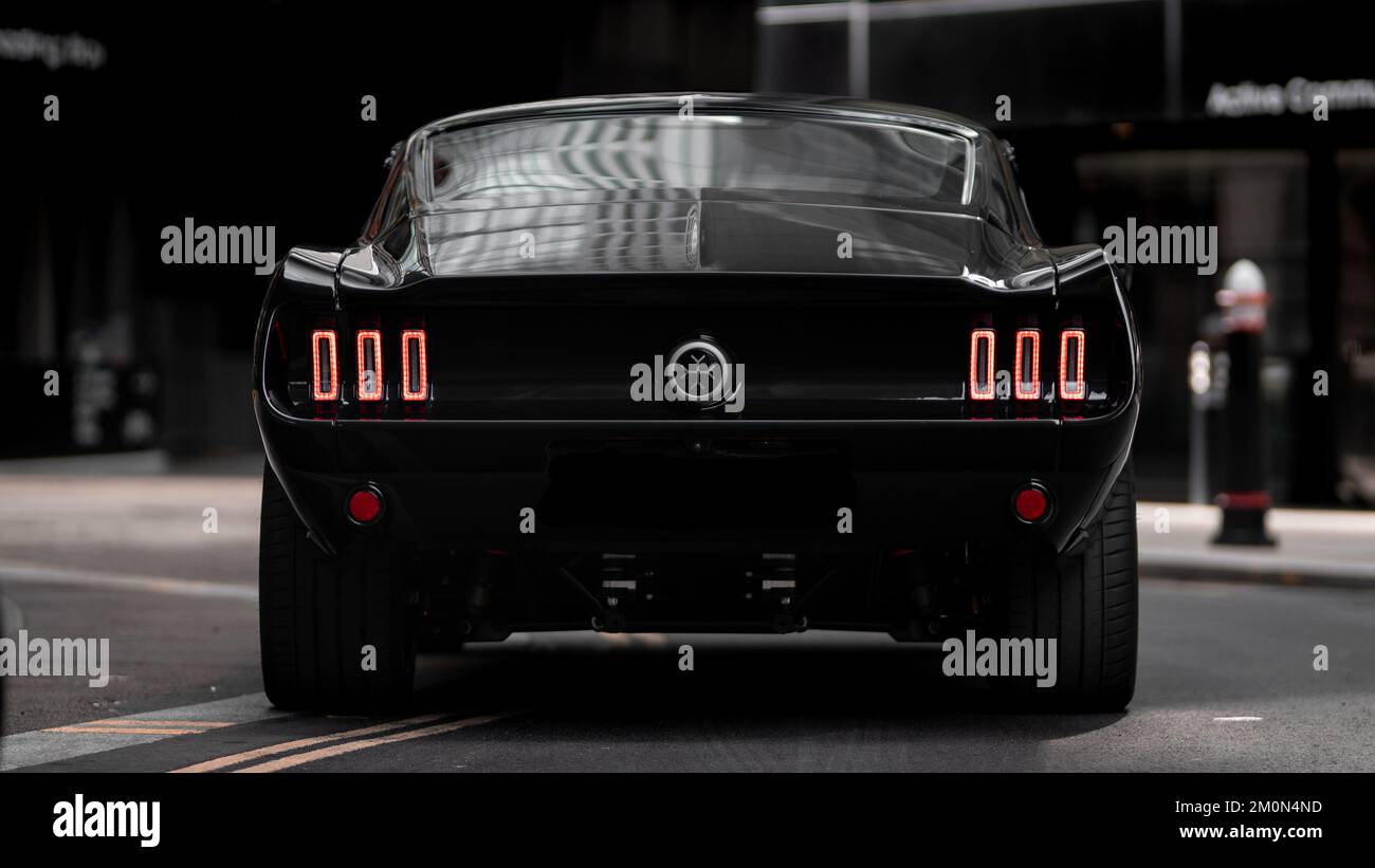 A rear view of the EV supercar, Mustang electric car in the financial ...