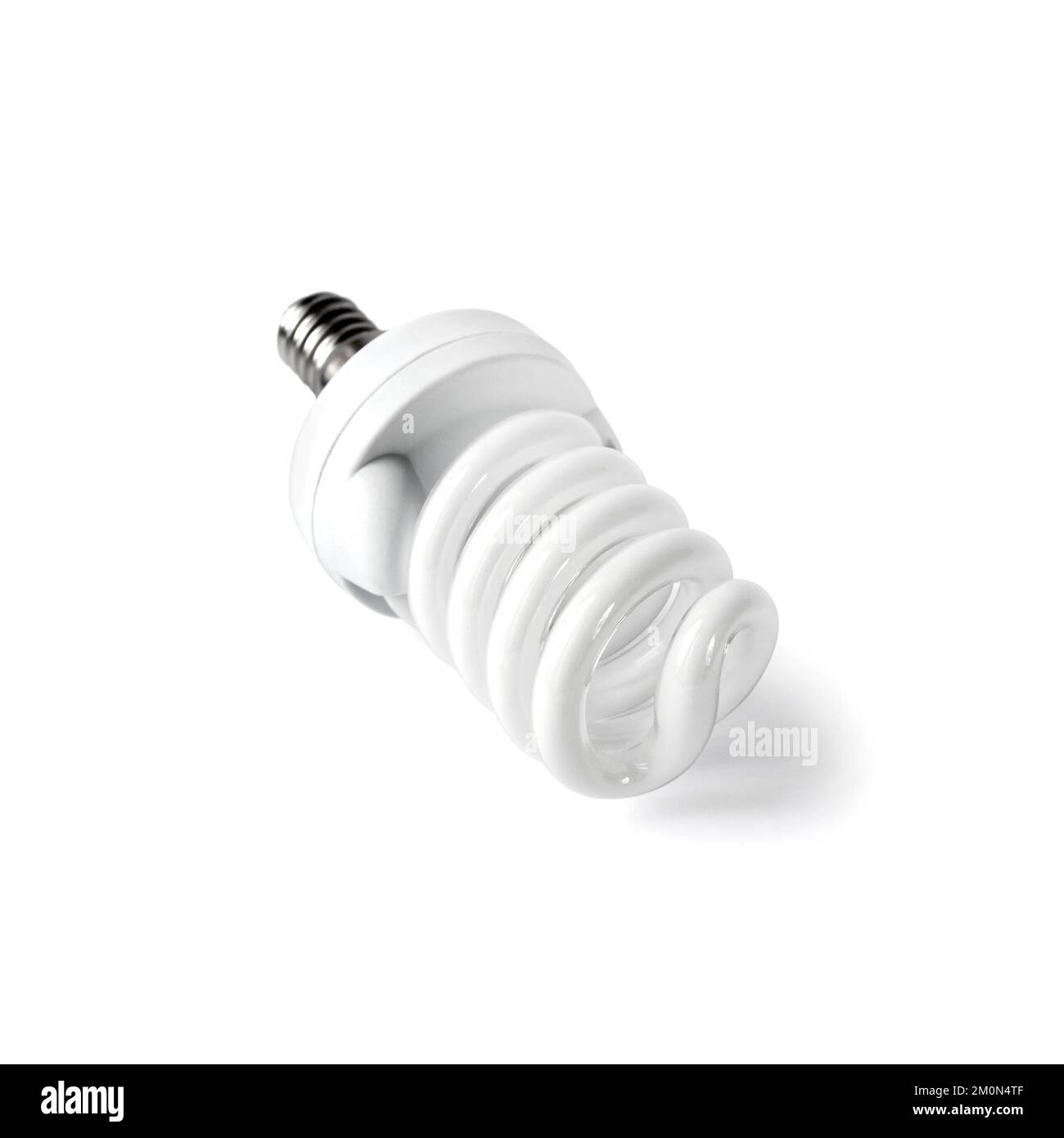 Energy saving fluorescent light bulb on white background isolated with ...