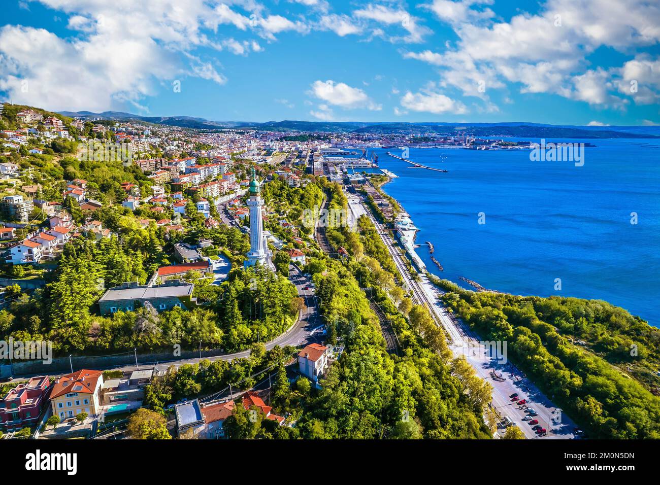 Trieste lighthouse Phare de la Victoire and cityscape panoramic aerial view, Friuli Venezia