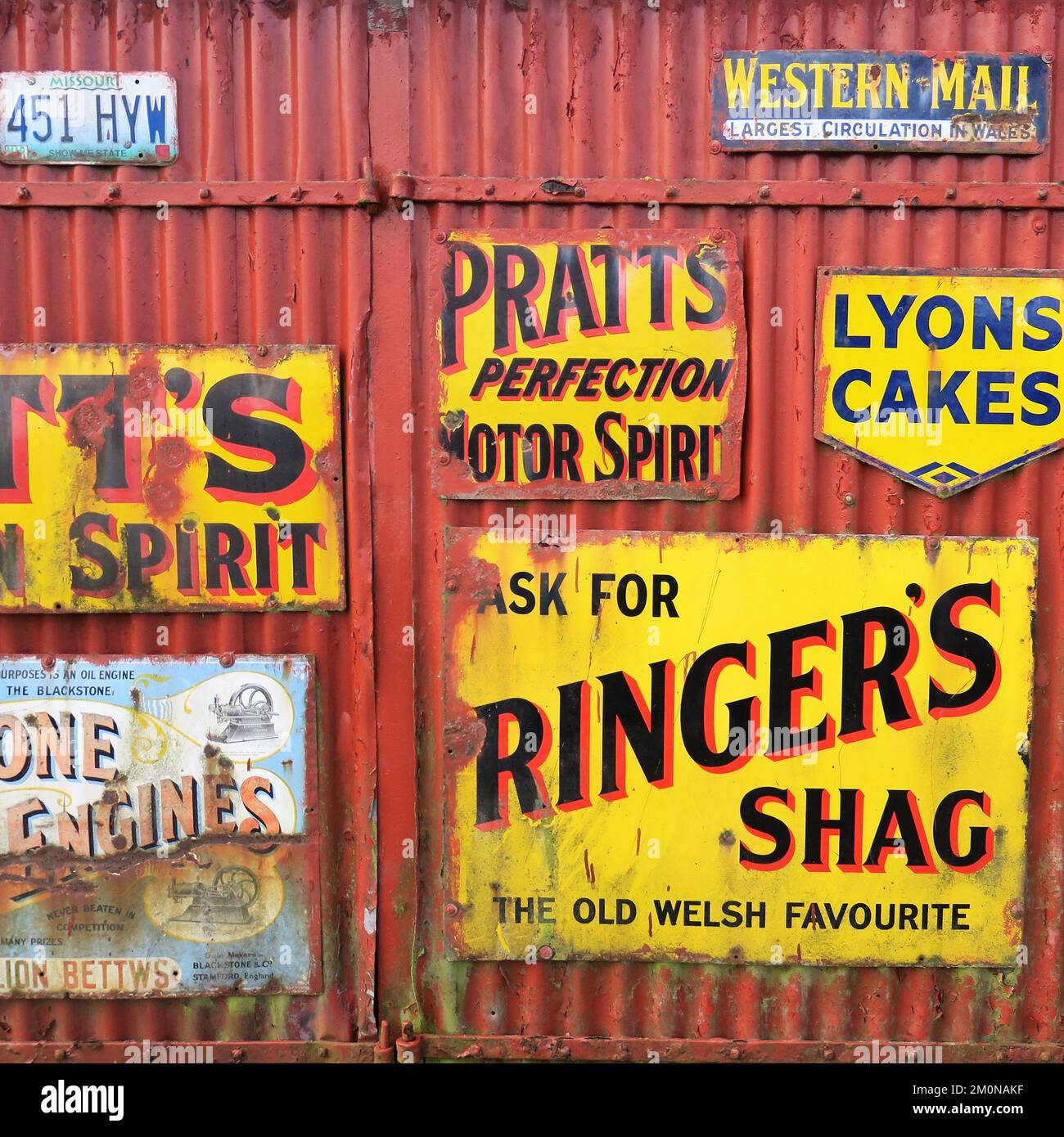 Enameled metal advertising boards or signs from a bygone era with