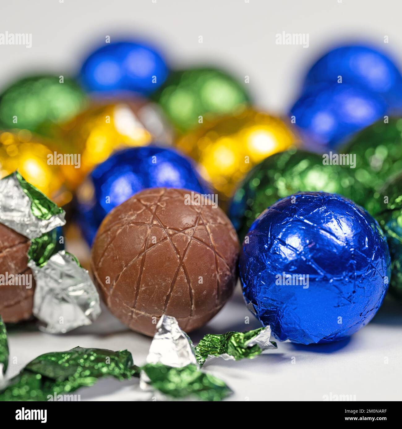Chocolate balls wrapped in aluminum foil Stock Photo Alamy