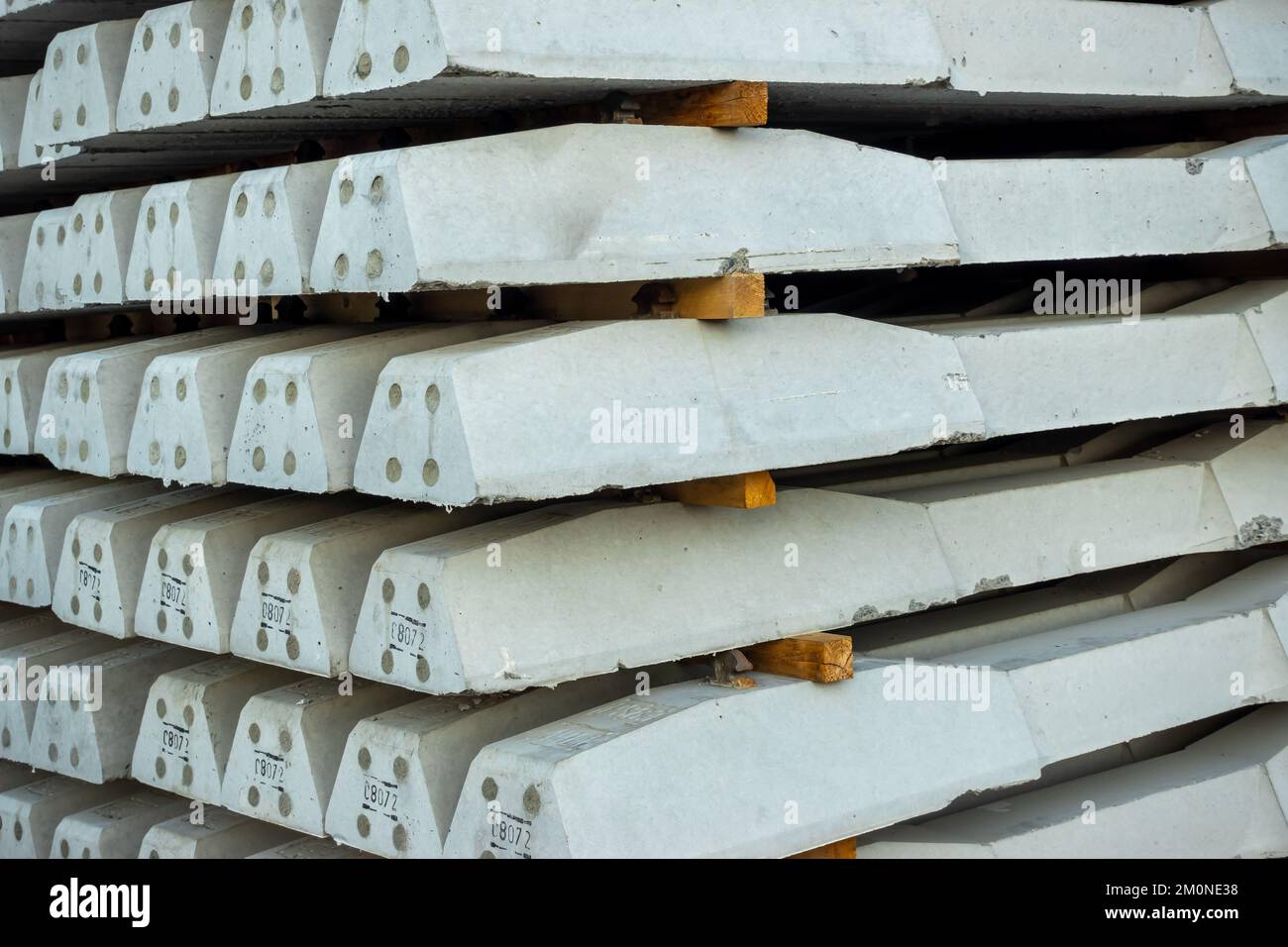 Stacks of concrete railway sleepers at the construction site of a new ...