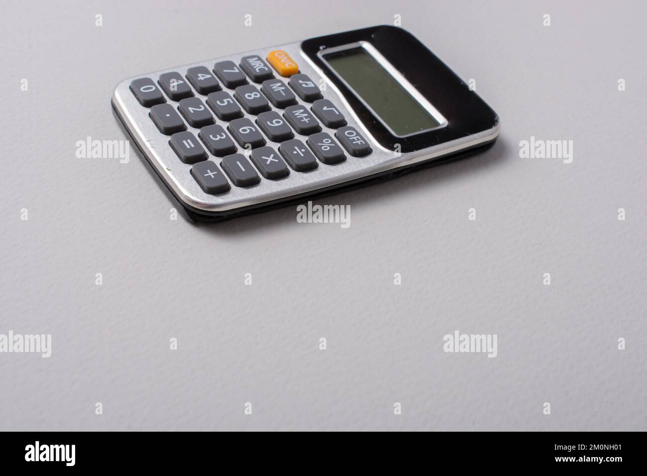 Little size calculator placed on white background Stock Photo Alamy