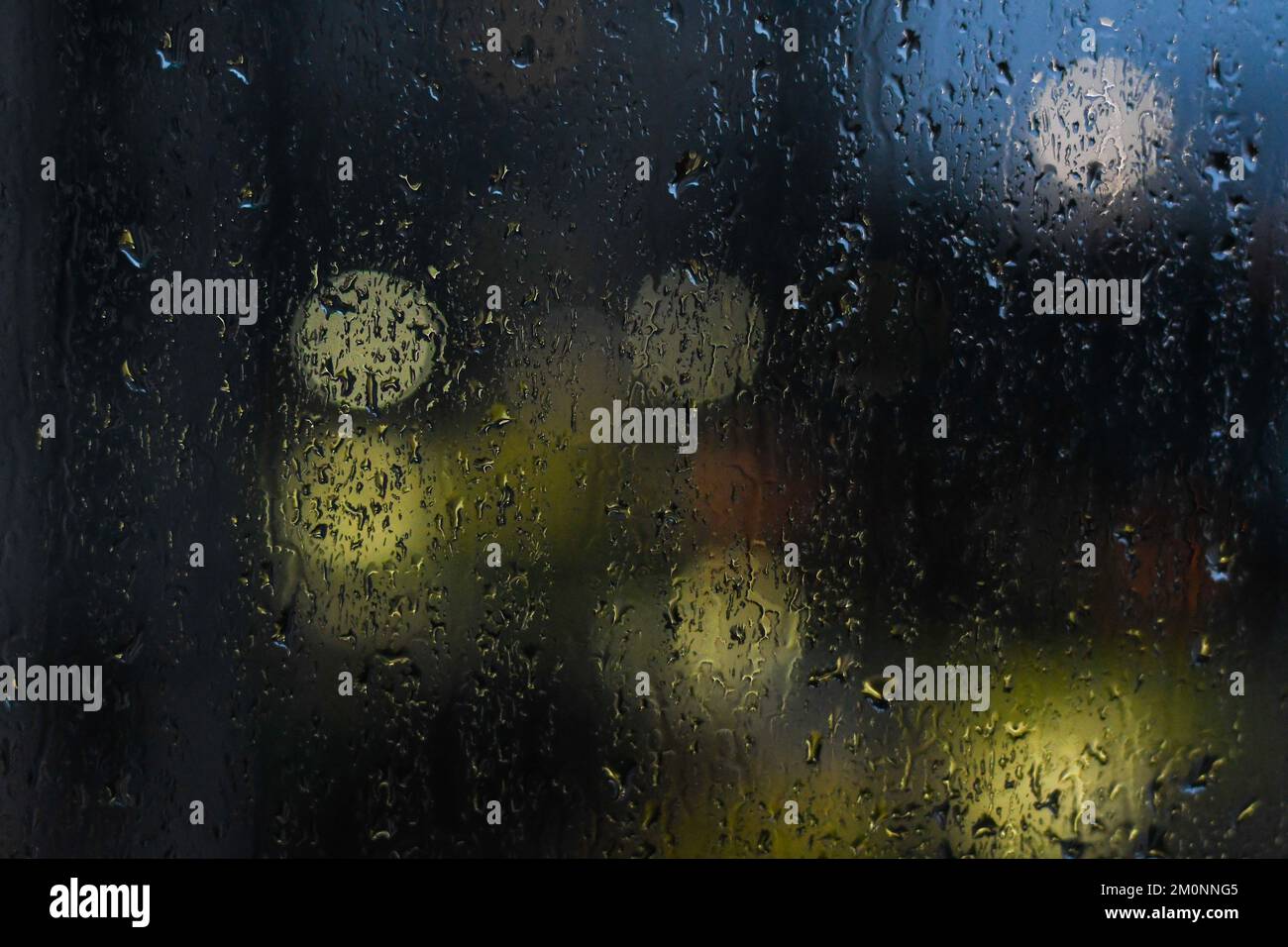 Raindrops falling on the window Stock Photo