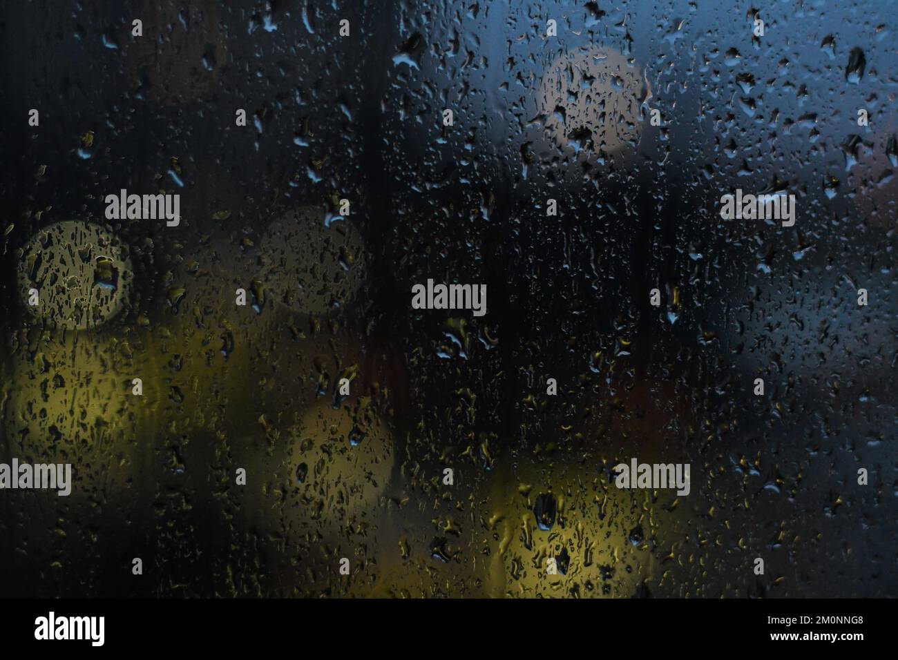 Raindrops falling on the window Stock Photo