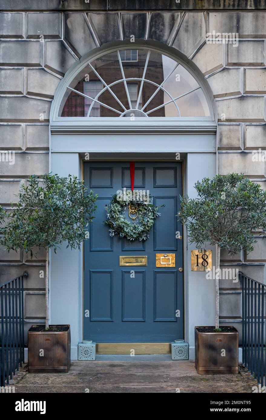 townhouse fanlight and front door with Christmas wreath