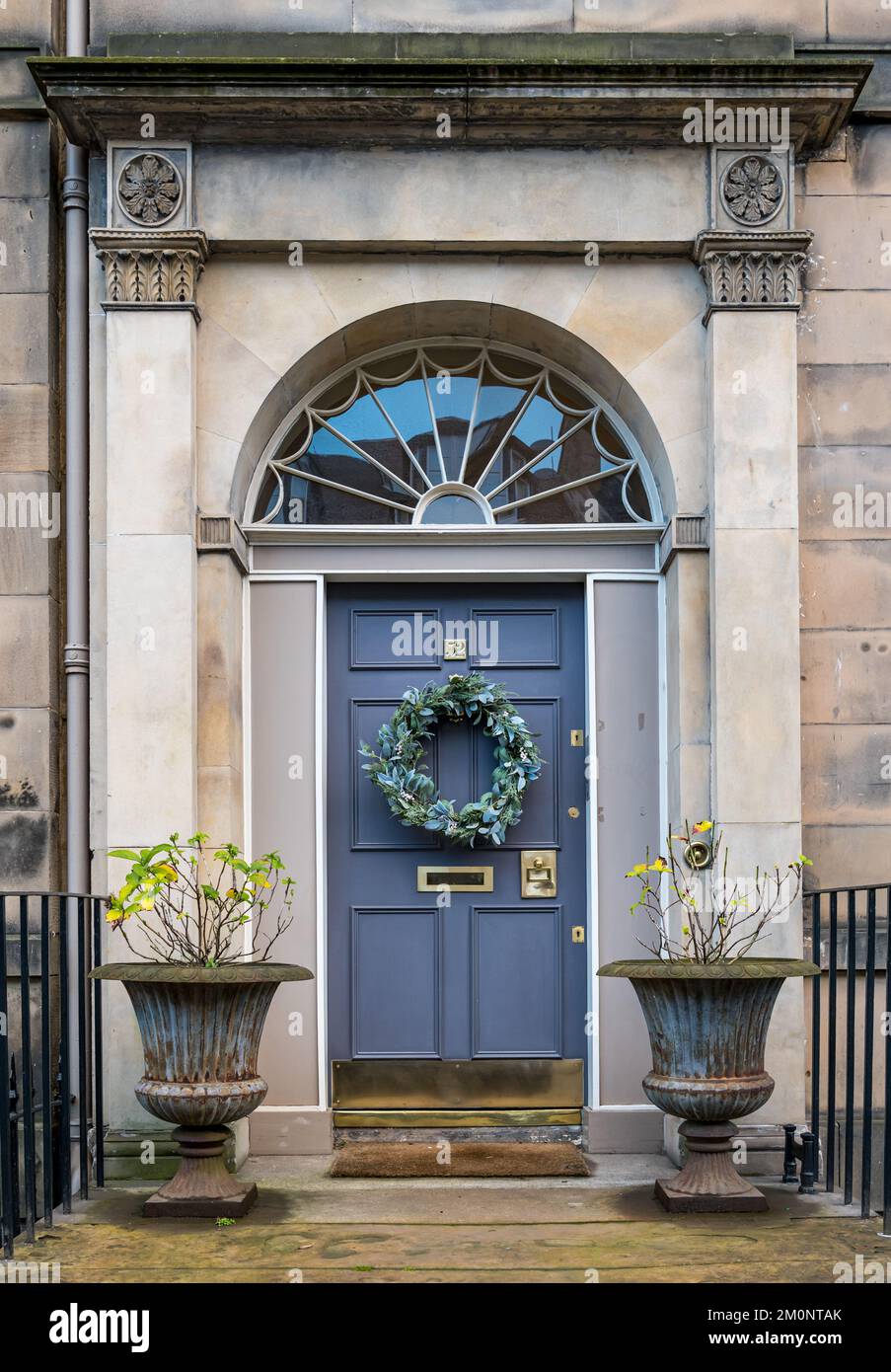 townhouse fanlight and front door with Christmas wreath