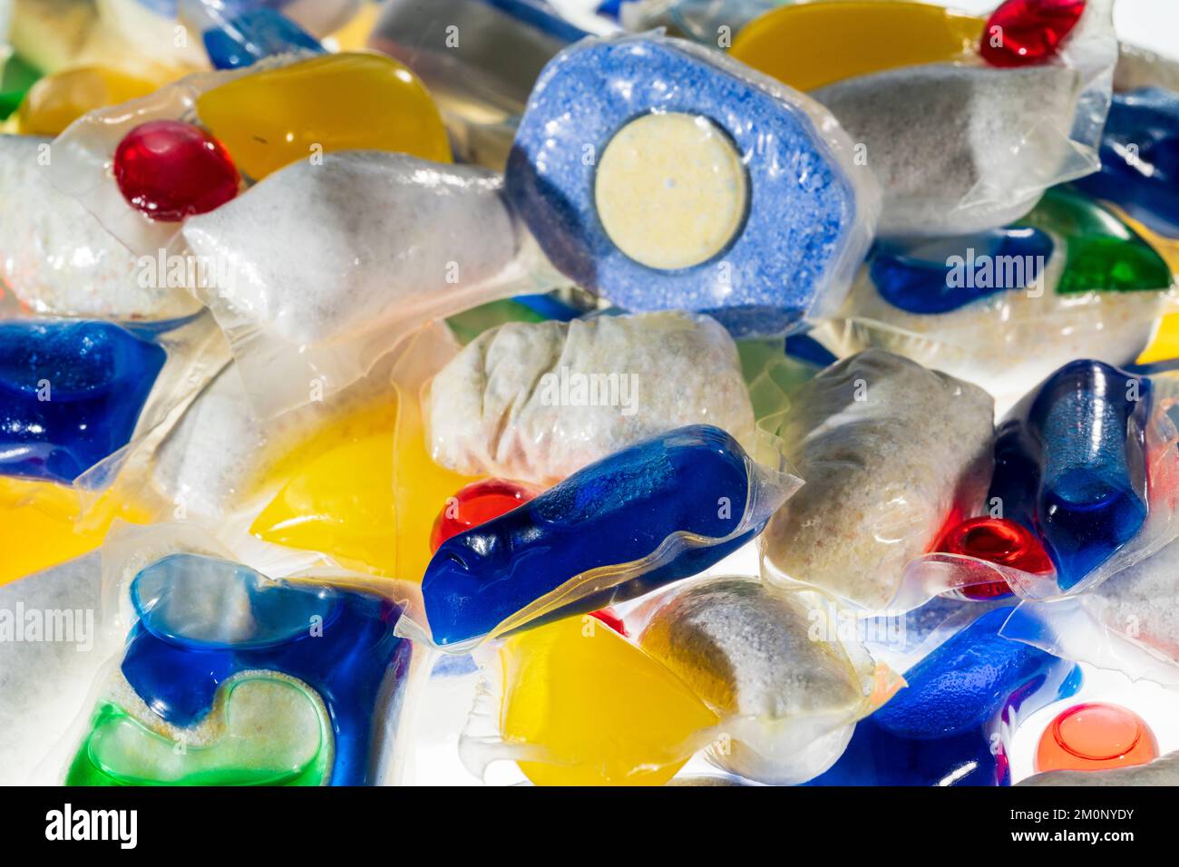 Dishwasher tablets. Close up of various brands, (no brand names showing