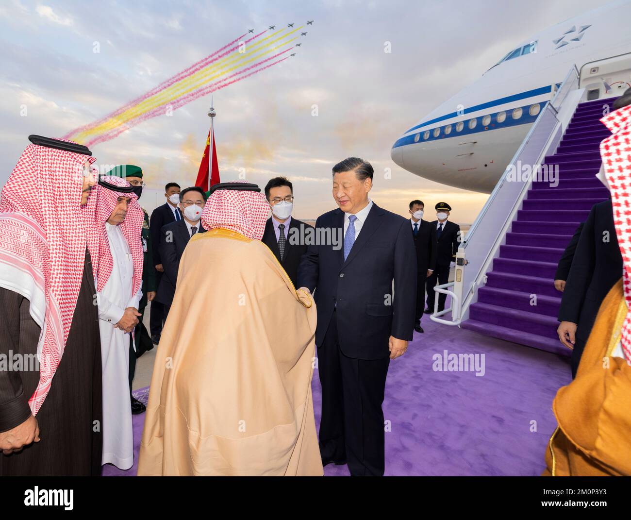 (221207) -- RIYADH, Dec. 7, 2022 (Xinhua) -- Chinese President Xi Jinping is warmly greeted upon his arrival by Governor of Riyadh Province Prince Faisal bin Bandar Al Saud, Foreign Minister Prince Faisal bin Farhan Al Saud, Minister Yasir Al-Rumayyan who works on China affairs and other key members of the royal family and senior officials of the government at the King Khalid International Airport in Riyadh, Saudi Arabia, Dec. 7, 2022. Chinese President Xi Jinping arrived here Wednesday afternoon to attend the first China-Arab States Summit and the China-Gulf Cooperation Council (GCC) Summit, Stock Photo
