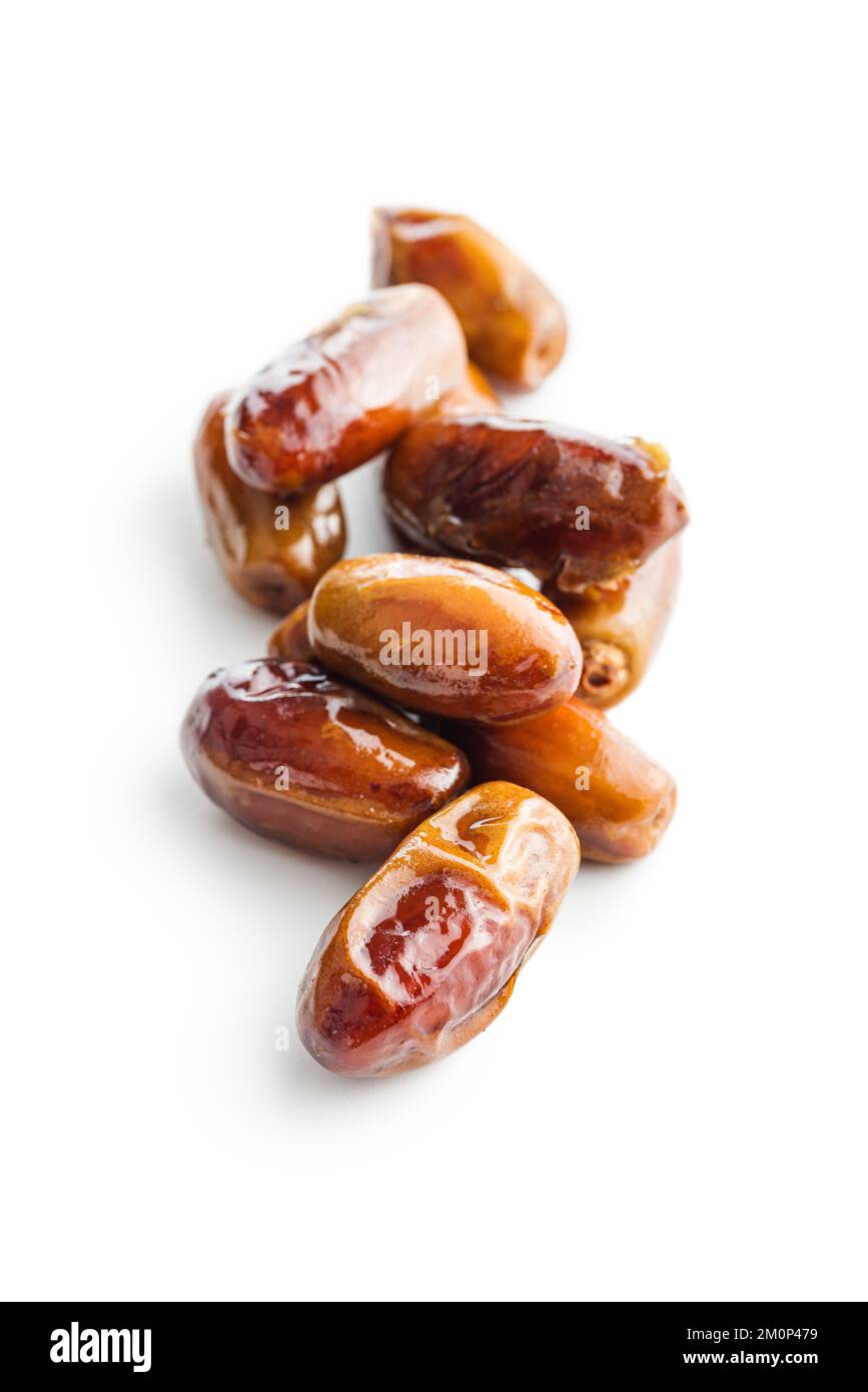 Dried dates fruit isolated on the white background. Stock Photo