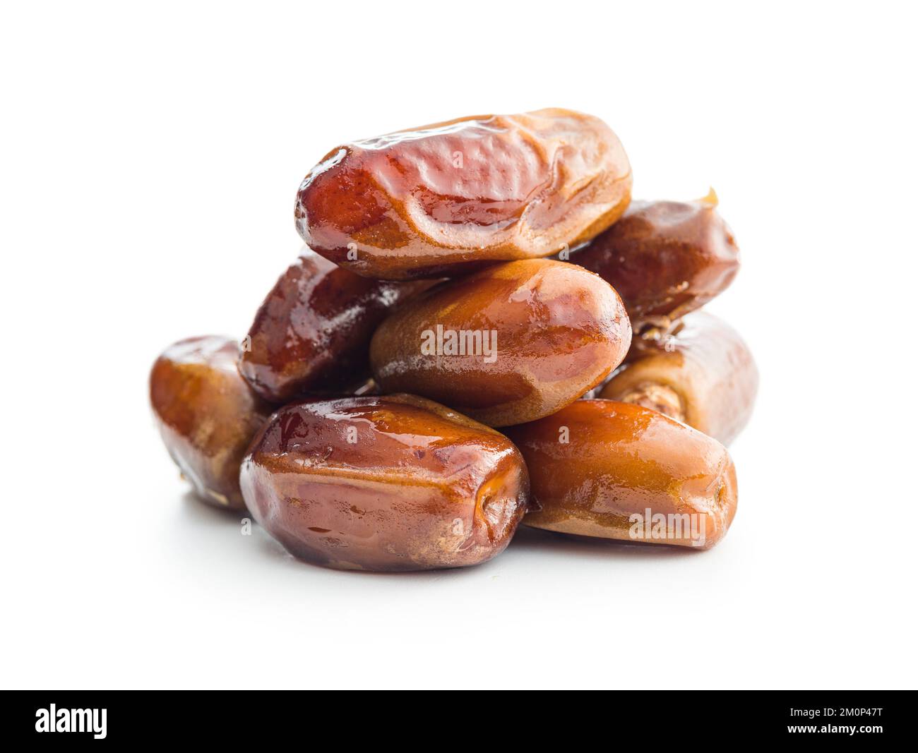 Dried dates fruit isolated on the white background. Stock Photo