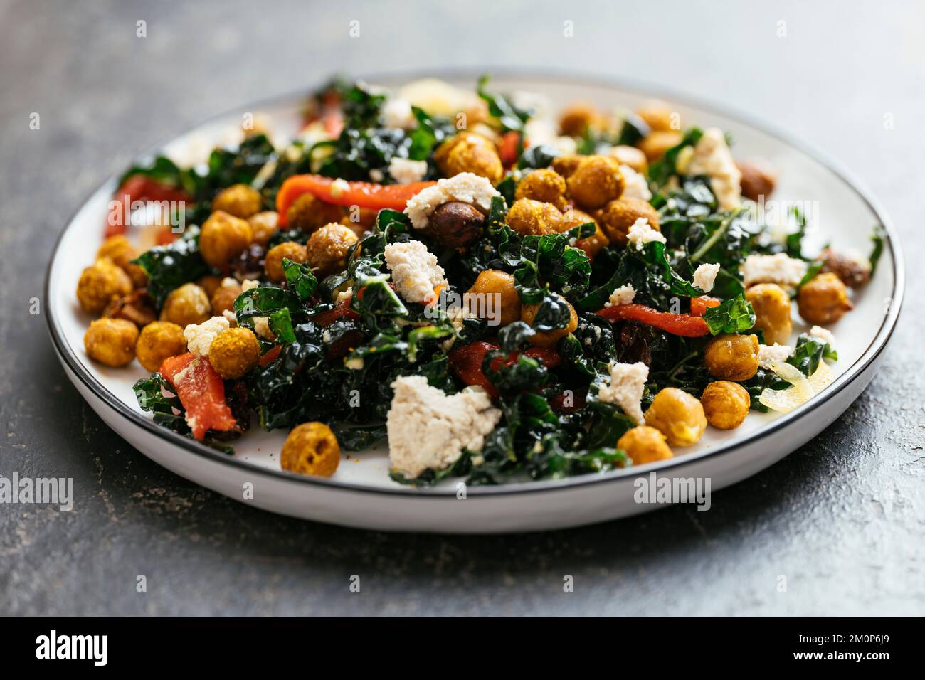 Home made vegan Moroccan kale salad with dinosaur kale, roasted