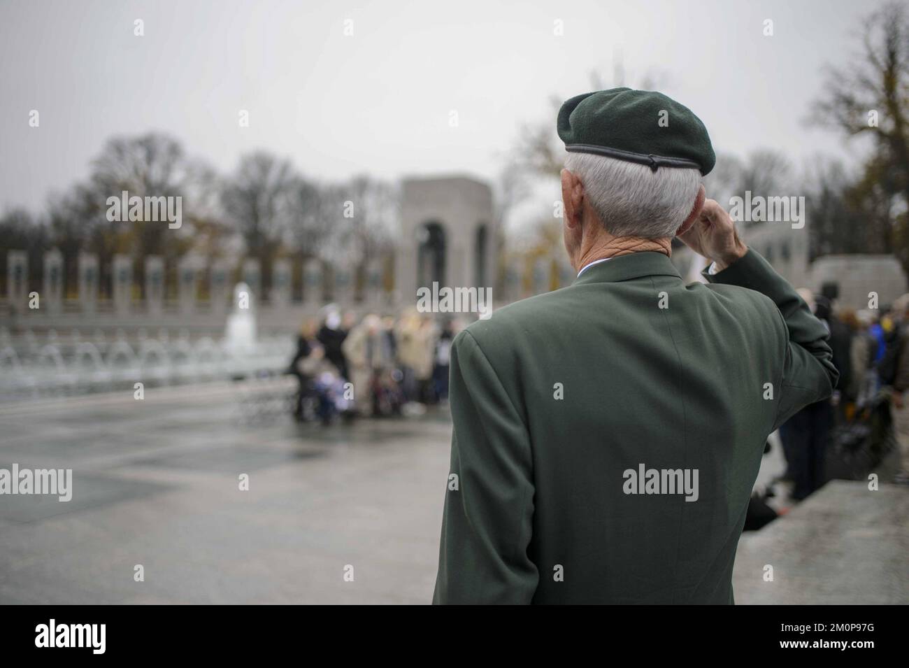Washington, United States. 07th Dec, 2022. A veteran salutes for The National Anthem during a wreath-laying ceremony held by The National Parks Service and The Friends of the National World War II Memorial to commemorate the 81st anniversary of the Battle of Pearl Harbor at the National World War II Memorial in Washington, DC on Wednesday, December 7, 2021. Photo by Bonnie Cash/UPI Credit: UPI/Alamy Live News Stock Photo
